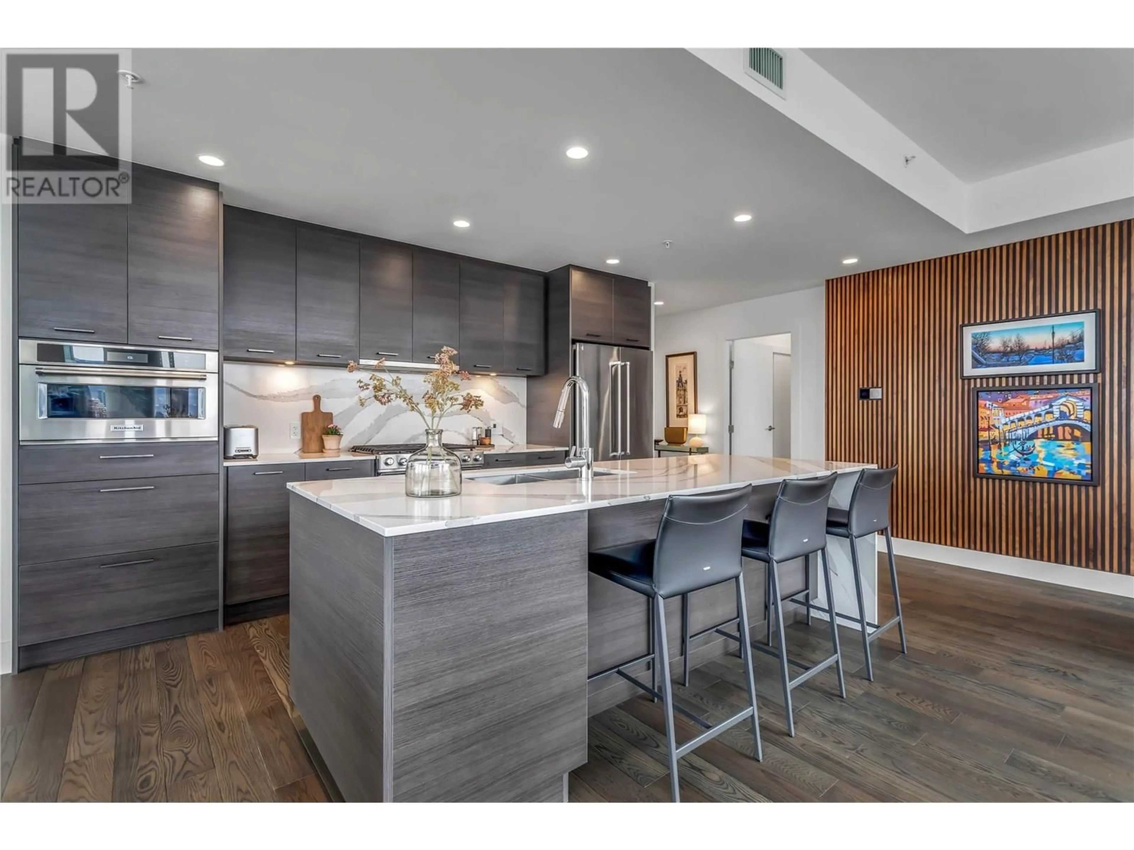 Contemporary kitchen, wood/laminate floor for 1403 - 1181 SUNSET DRIVE, Kelowna British Columbia V1Y0J4
