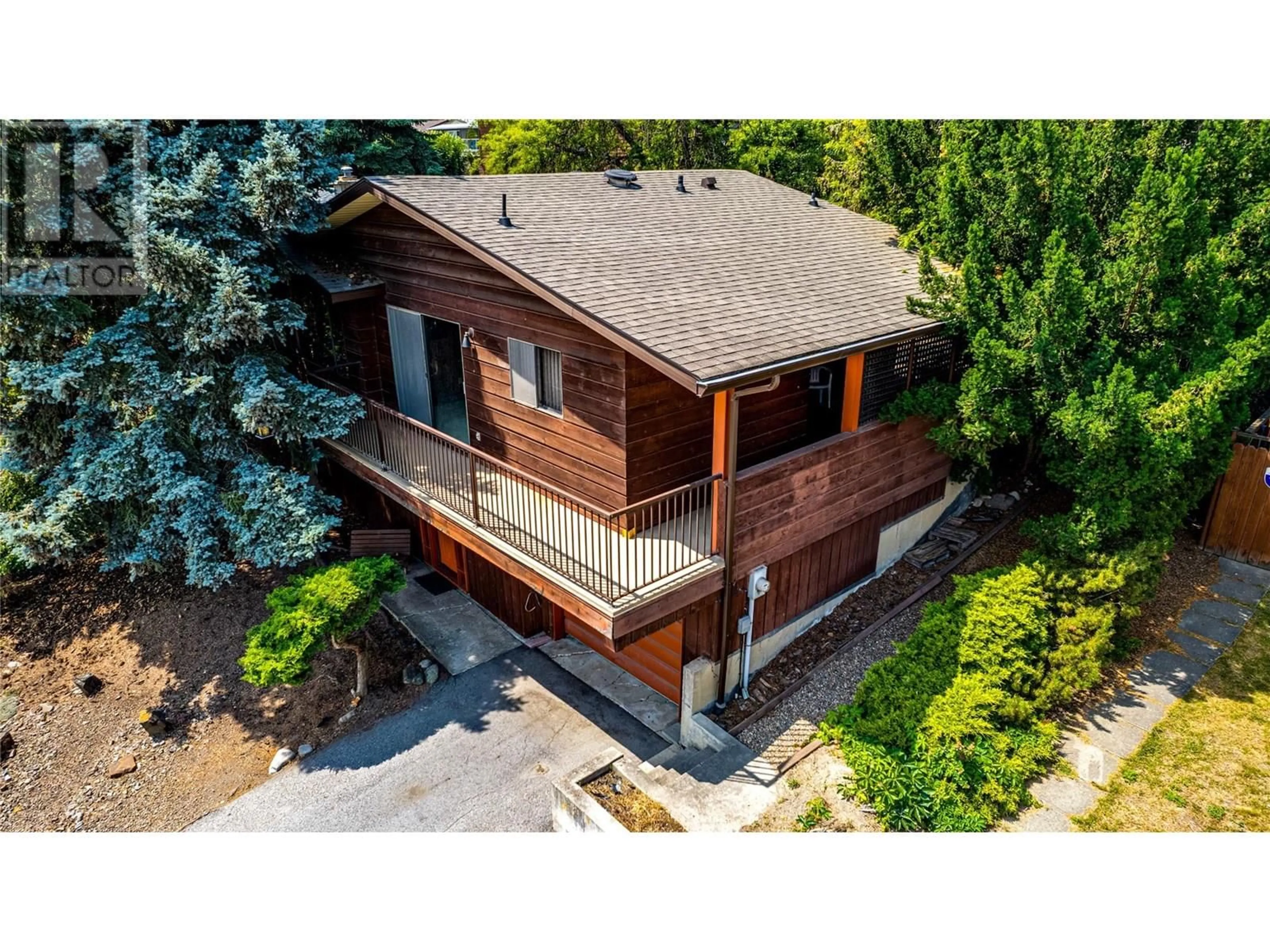 A pic from outside/outdoor area/front of a property/back of a property/a pic from drone, unknown for 3800 38 STREET, Vernon British Columbia V1T7L2