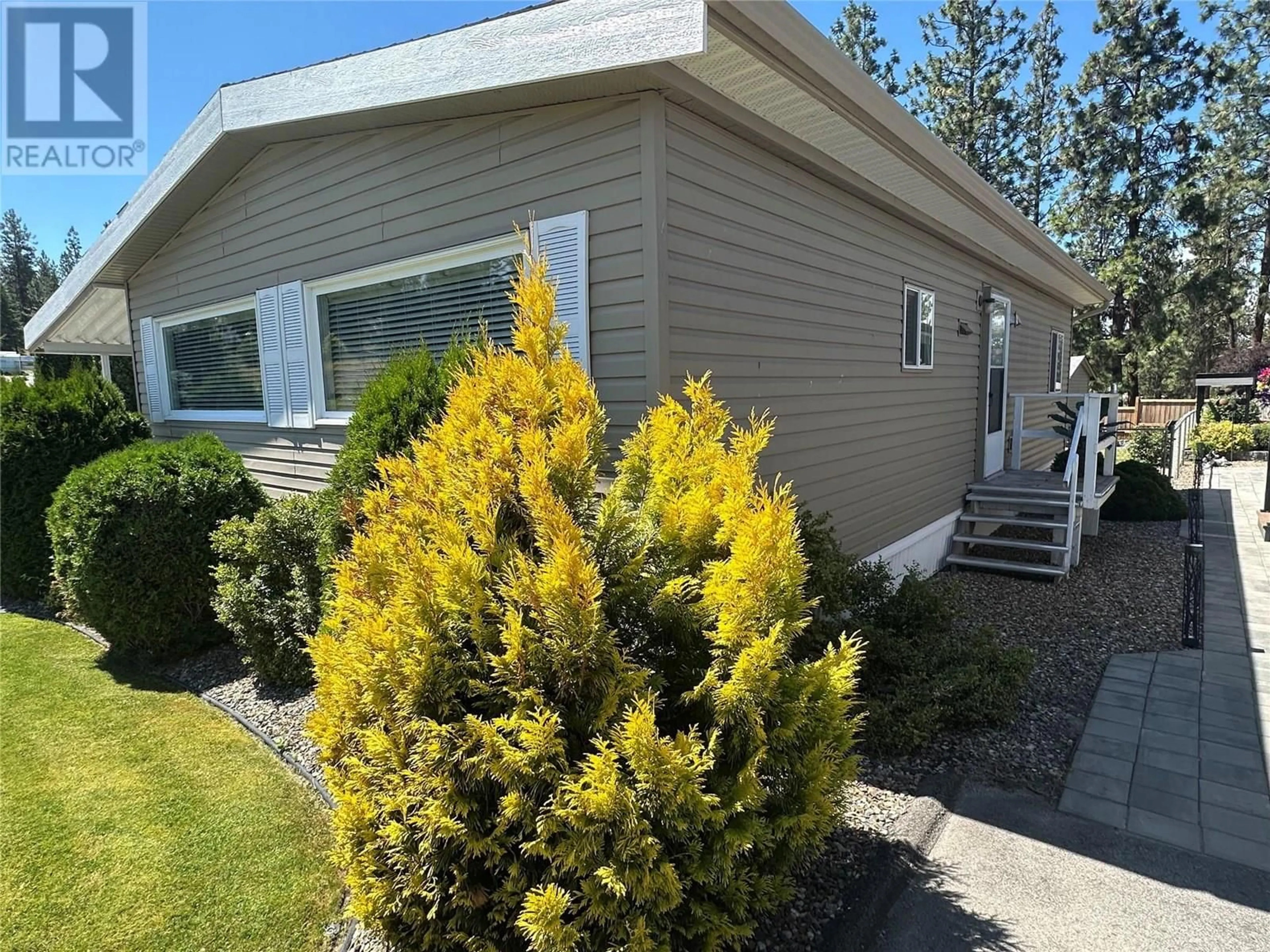 Home with vinyl exterior material, street for 51 - 3535 MCCULLOCH ROAD, Kelowna British Columbia V1W4R8