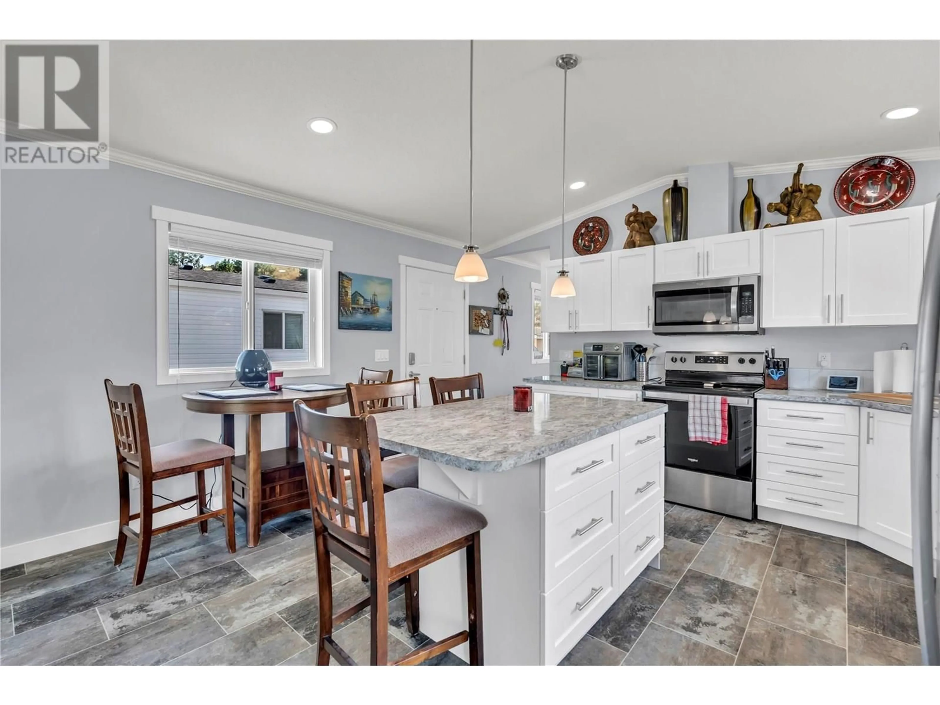 Open concept kitchen, ceramic/tile floor for 82 - 201 HIGHWAY 97 OTHER, Penticton British Columbia V2A0E4