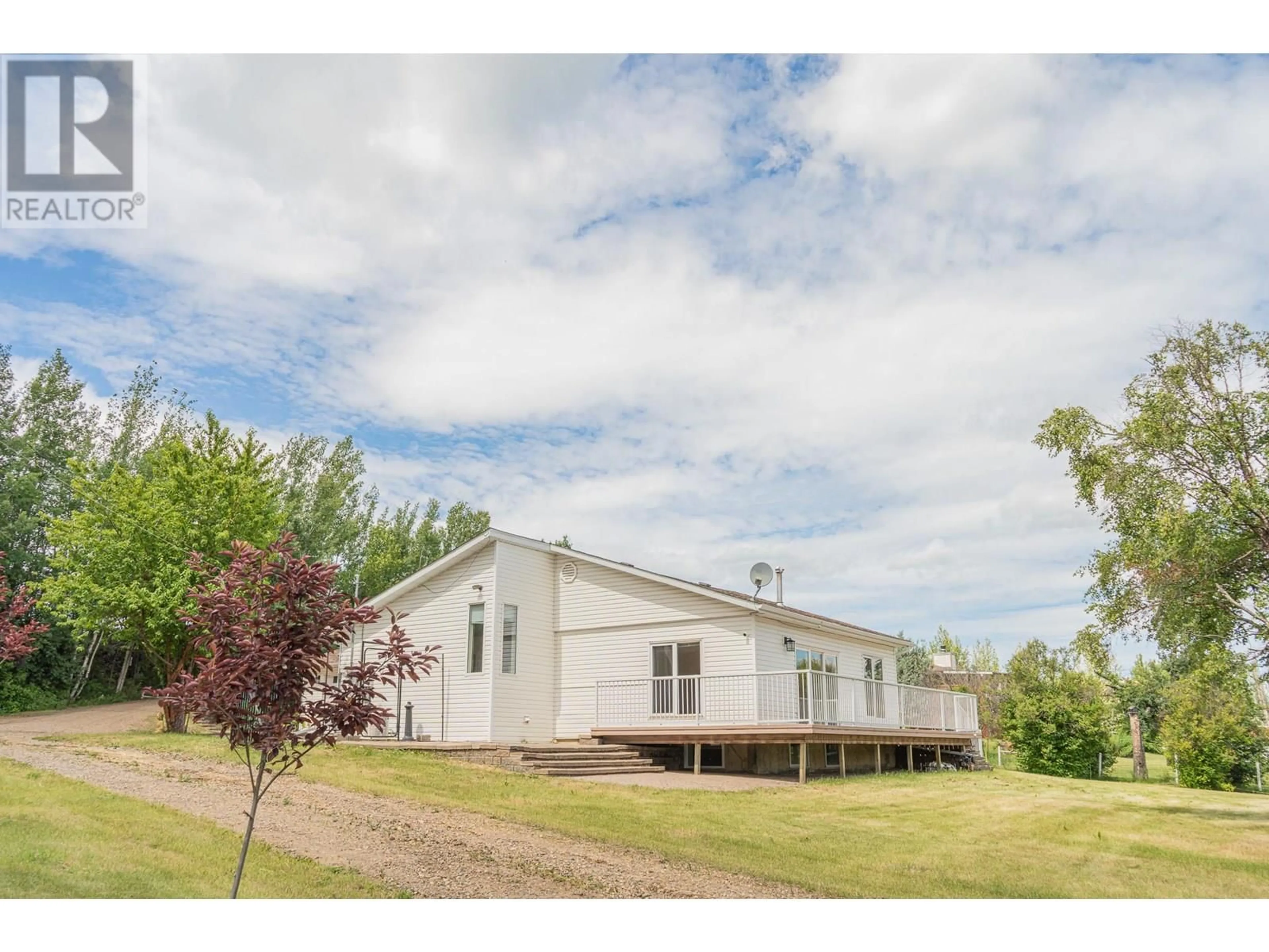 A pic from outside/outdoor area/front of a property/back of a property/a pic from drone, building for 5105/5101 53 STREET, Pouce Coupe British Columbia V0C2C0