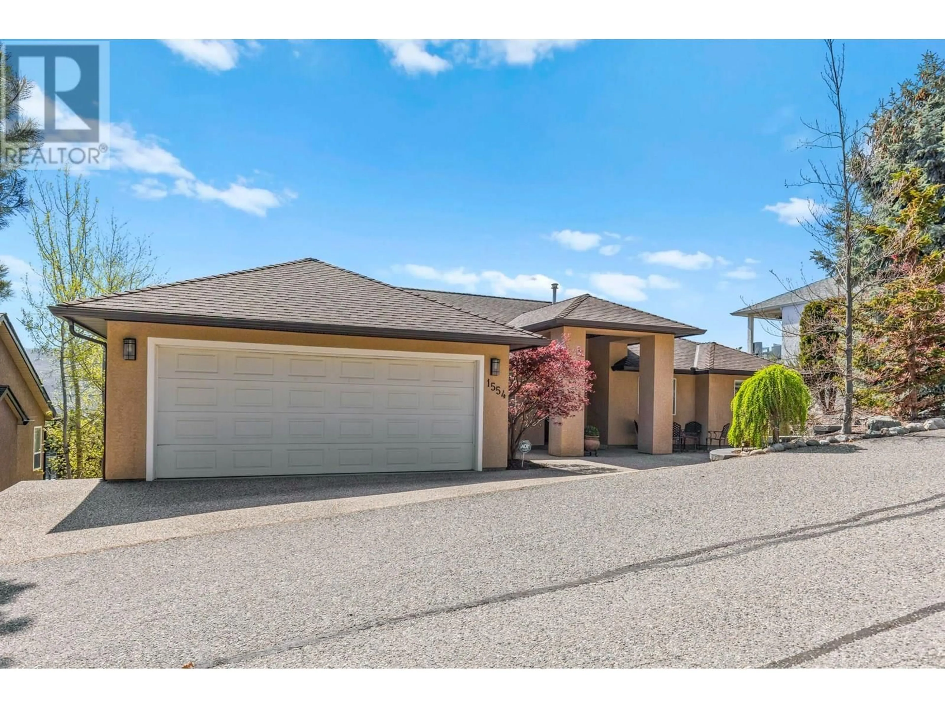 A pic from outside/outdoor area/front of a property/back of a property/a pic from drone, street for 1554 CHARDONNAY PLACE, West Kelowna British Columbia V4T2P9