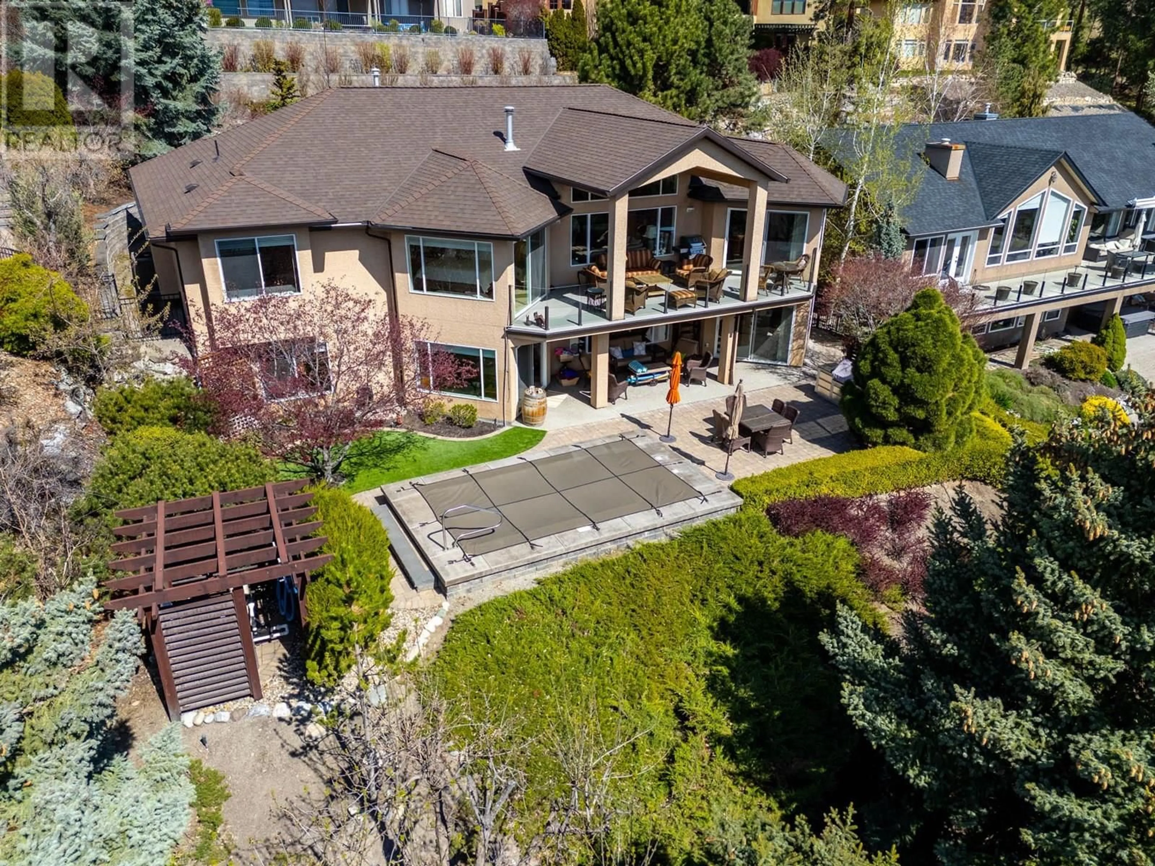 A pic from outside/outdoor area/front of a property/back of a property/a pic from drone, unknown for 1554 CHARDONNAY PLACE, West Kelowna British Columbia V4T2P9