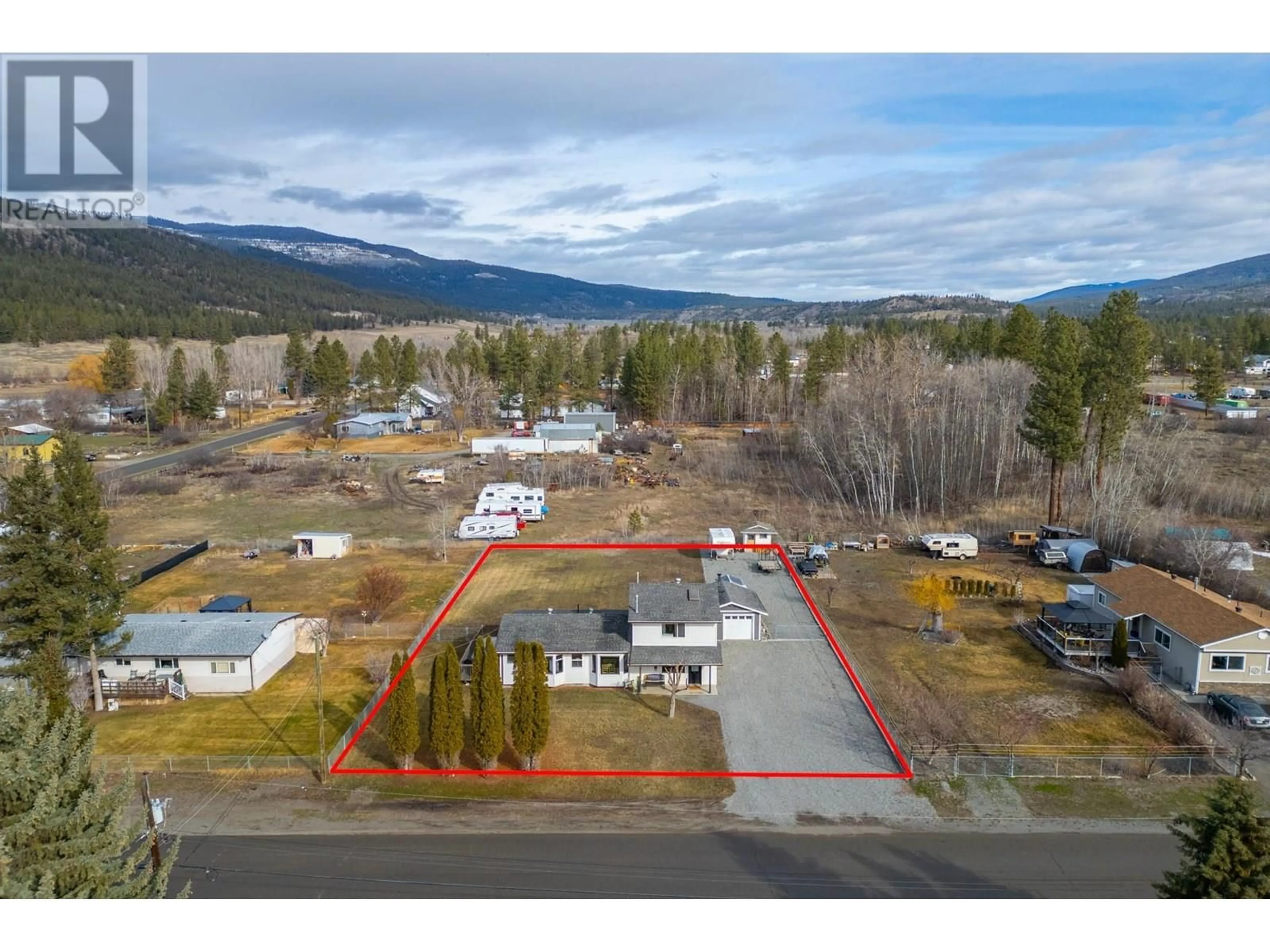 A pic from outside/outdoor area/front of a property/back of a property/a pic from drone, mountain view for 435 MORGAN AVENUE, Merritt British Columbia V0K1Y0