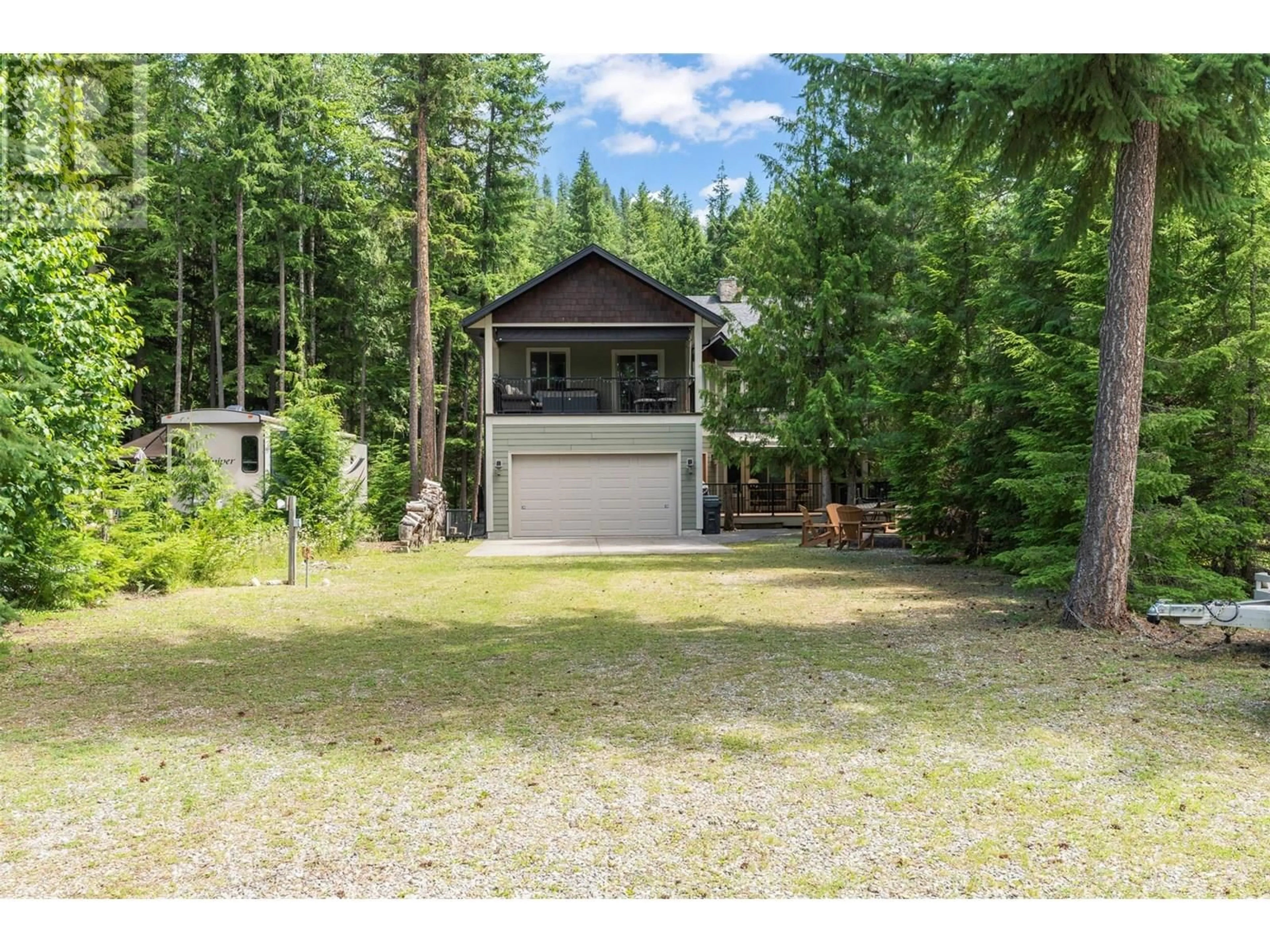 A pic from outside/outdoor area/front of a property/back of a property/a pic from drone, forest/trees view for 58 - 30 LUSK LAKE ROAD, Enderby British Columbia V0E1V5