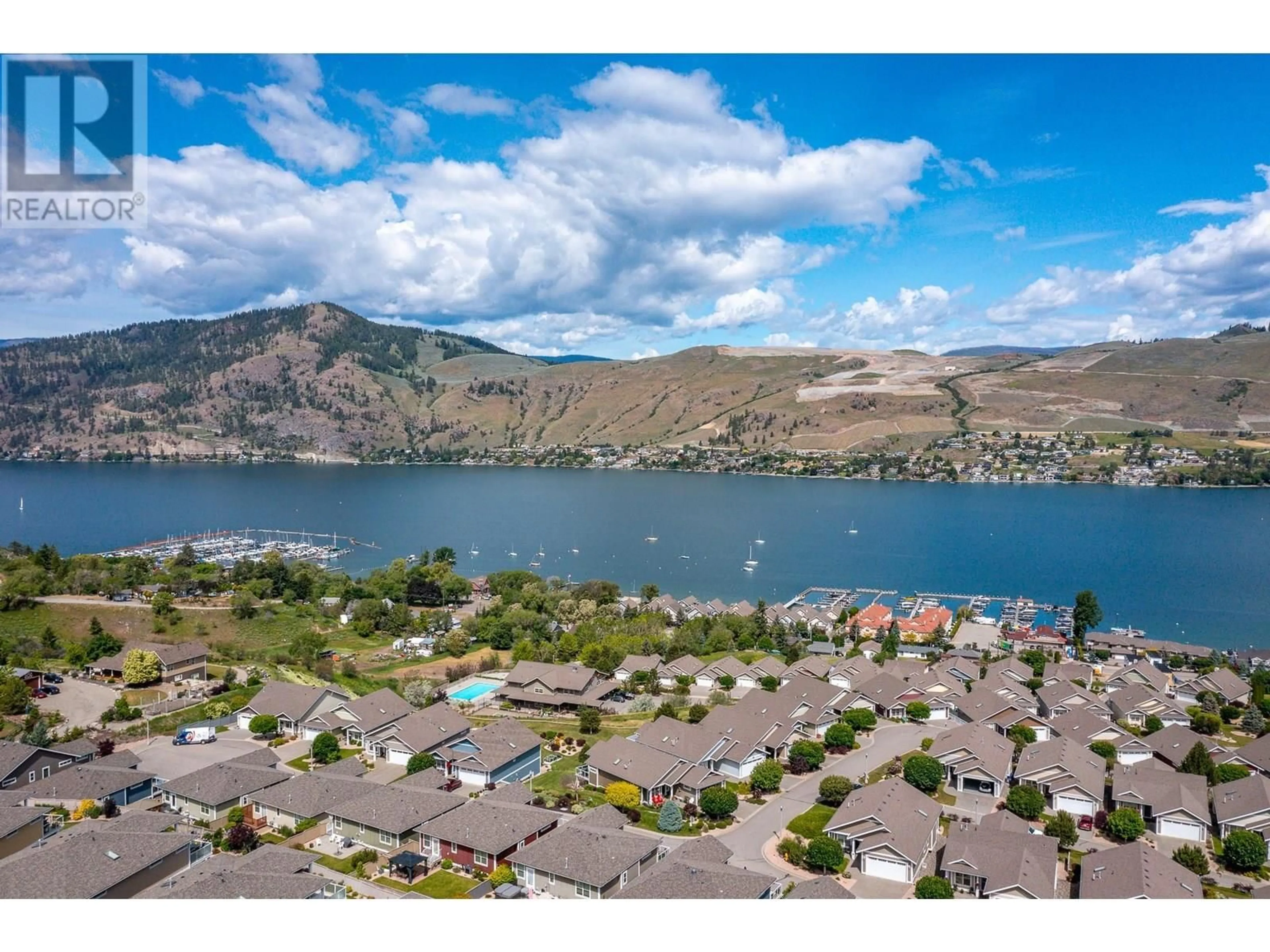A pic from outside/outdoor area/front of a property/back of a property/a pic from drone, water/lake/river/ocean view for 132 - 7760 OKANAGAN LANDING ROAD, Vernon British Columbia V1H1Z4