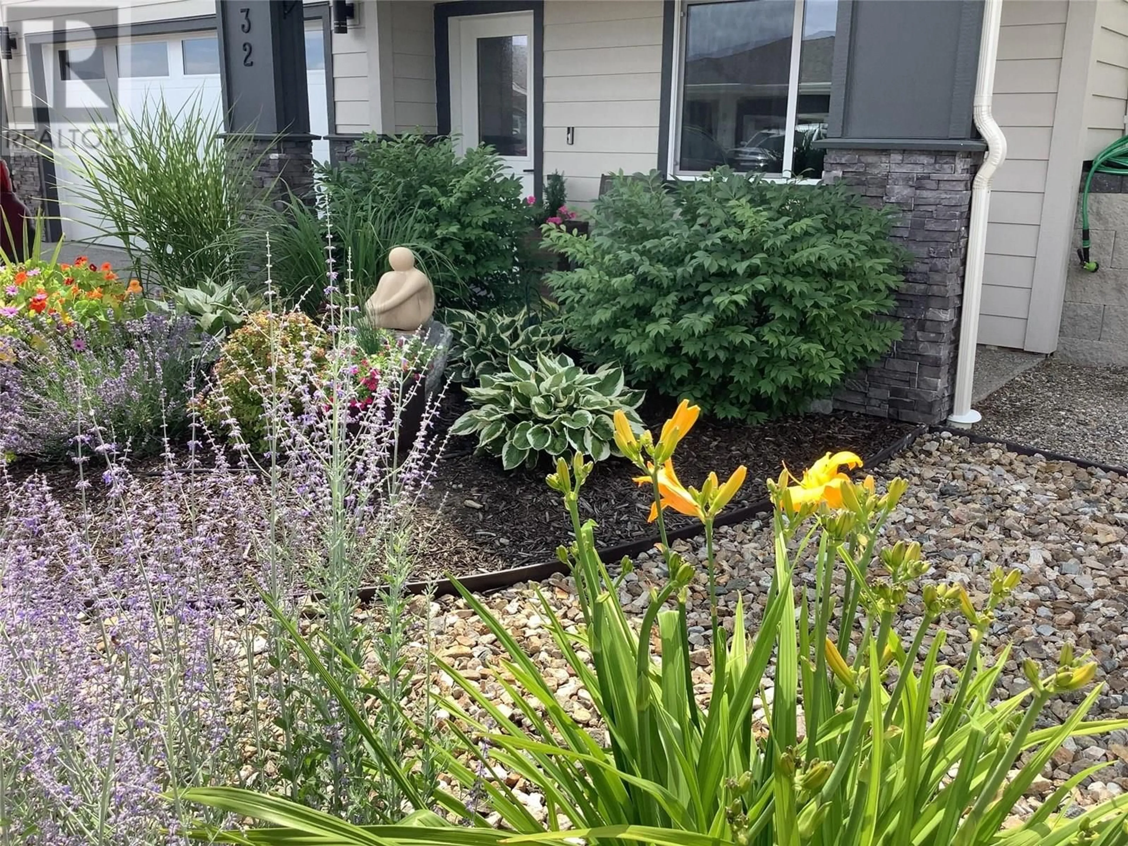 A pic from outside/outdoor area/front of a property/back of a property/a pic from drone, street for 132 - 7760 OKANAGAN LANDING ROAD, Vernon British Columbia V1H1Z4