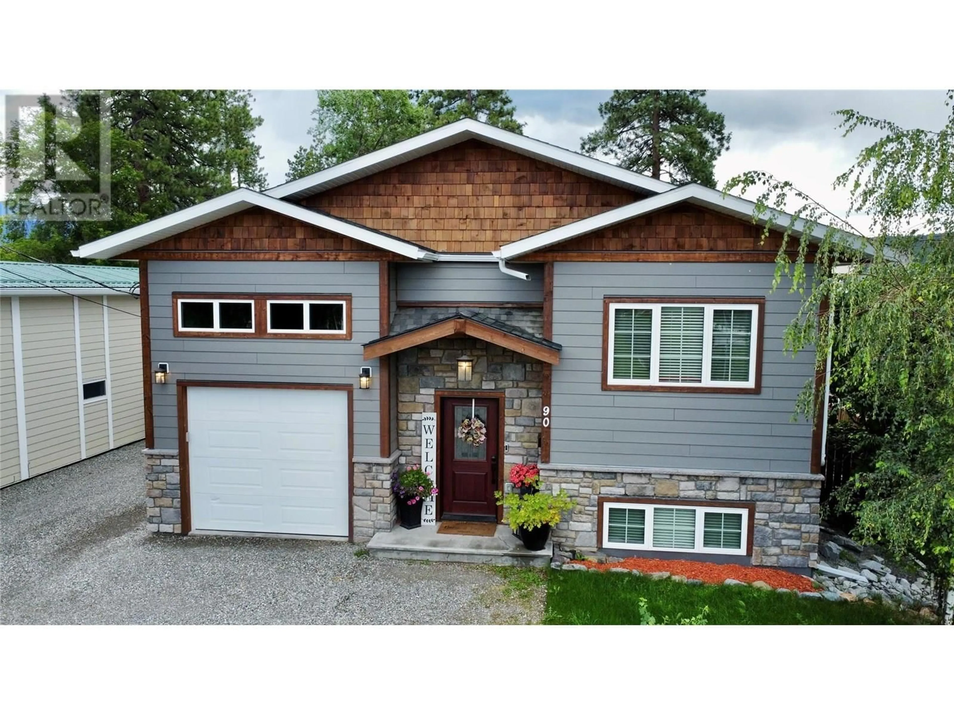 Home with vinyl exterior material, street for 90 WATTSVILLE ROAD, Cranbrook British Columbia V1C2A2