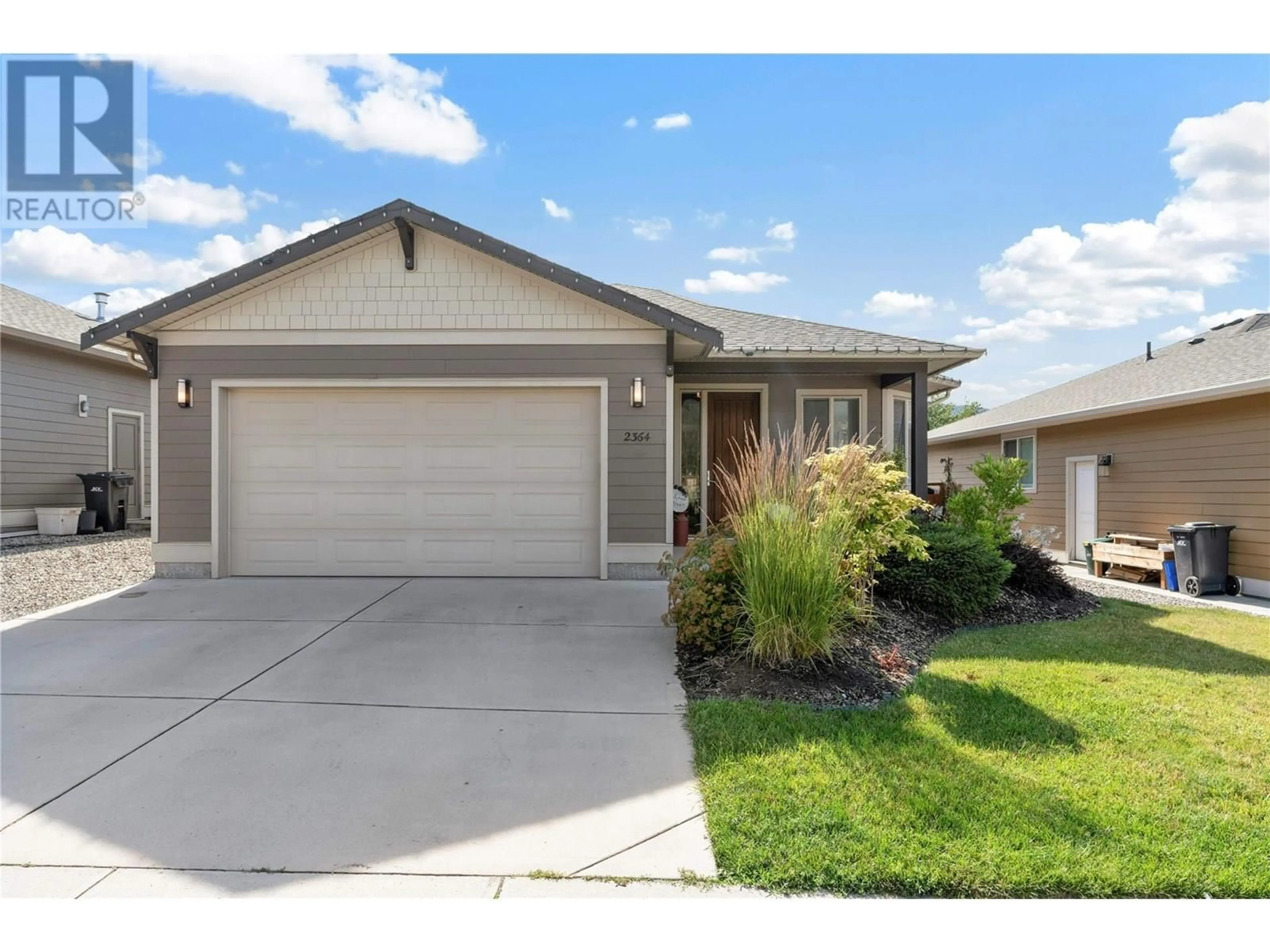 Home with vinyl exterior material, street for 2364 OGLOW DRIVE, Armstrong British Columbia V4Y0V9