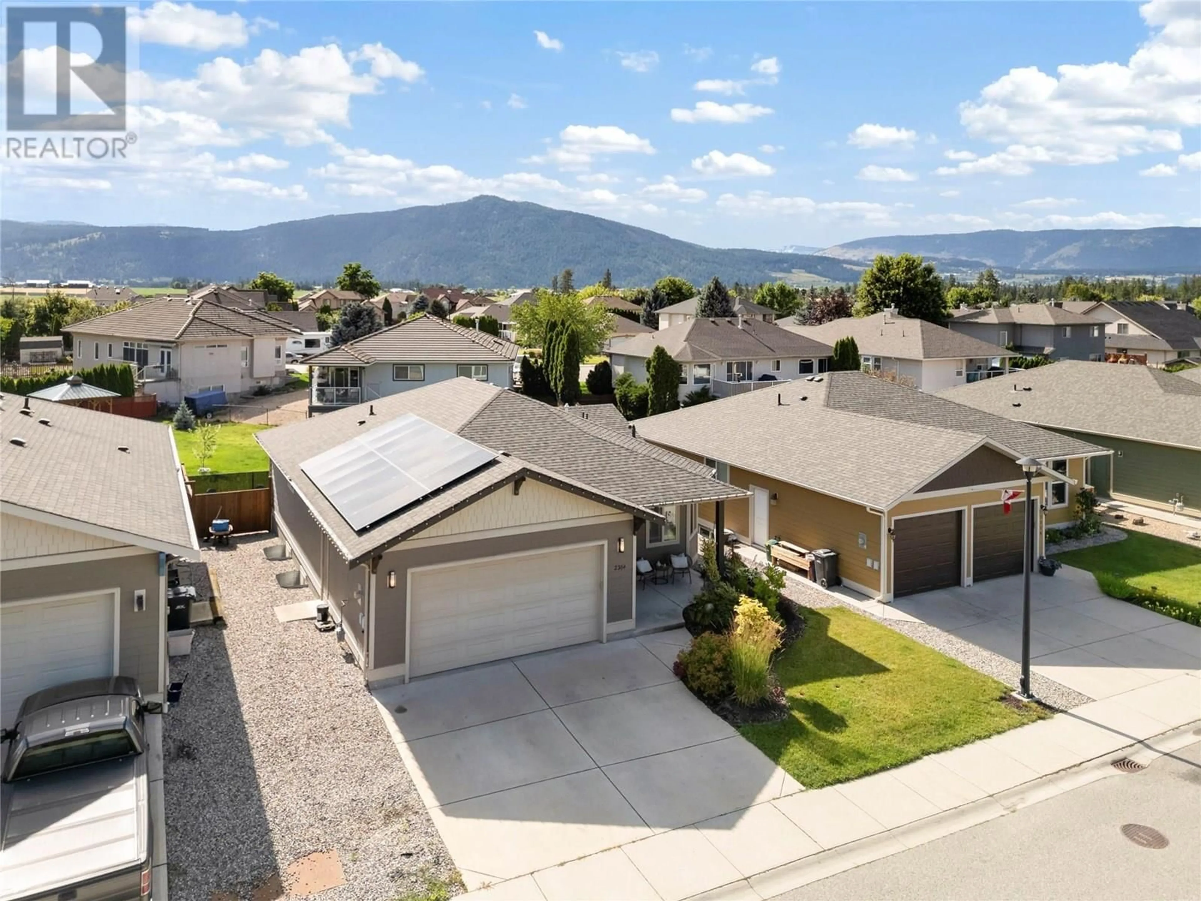 A pic from outside/outdoor area/front of a property/back of a property/a pic from drone, mountain view for 2364 OGLOW DRIVE, Armstrong British Columbia V4Y0V9