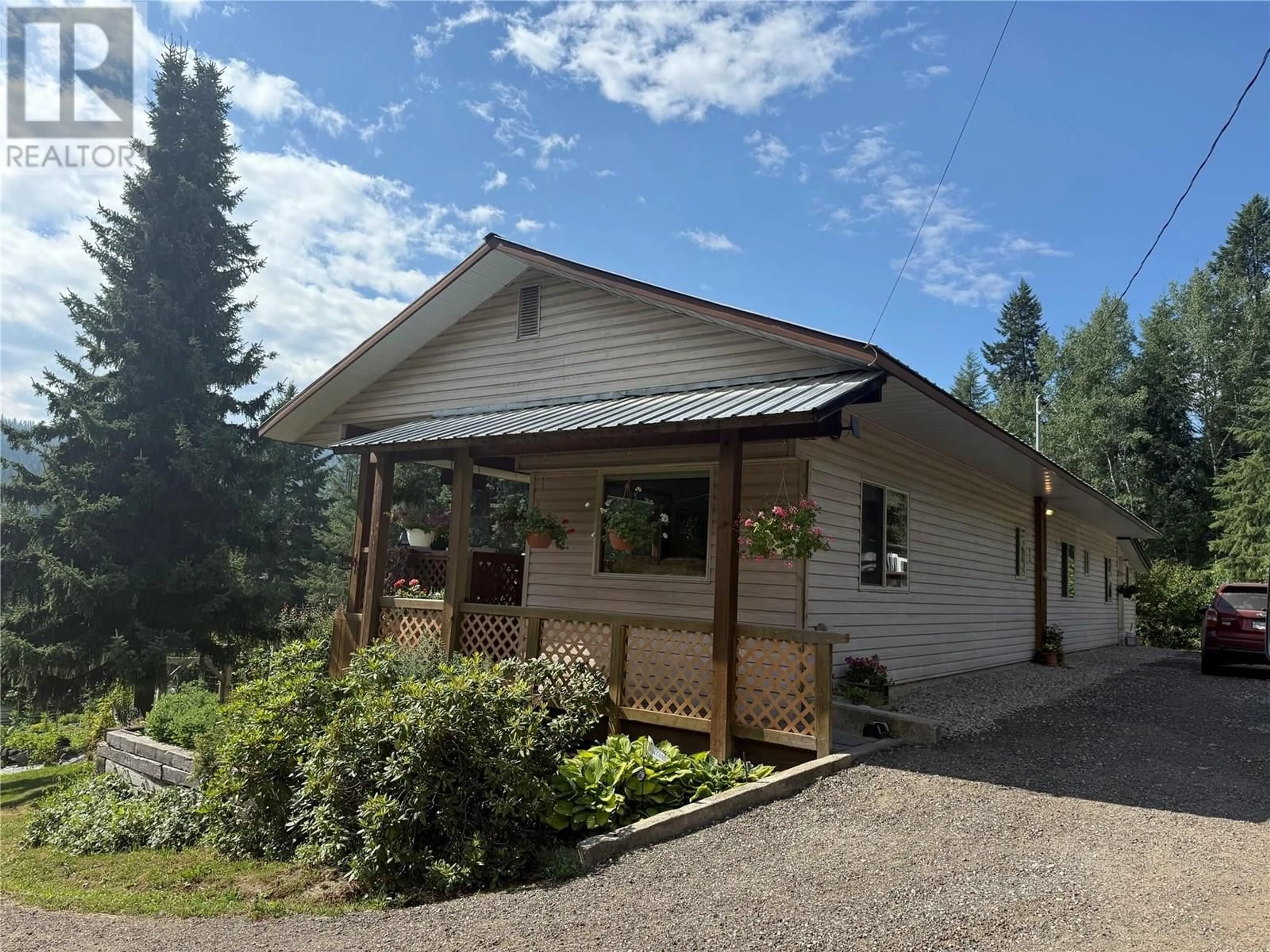 A pic from outside/outdoor area/front of a property/back of a property/a pic from drone, unknown for 1531 HIGHWAY 3B HIGHWAY, Fruitvale British Columbia V0G1L1