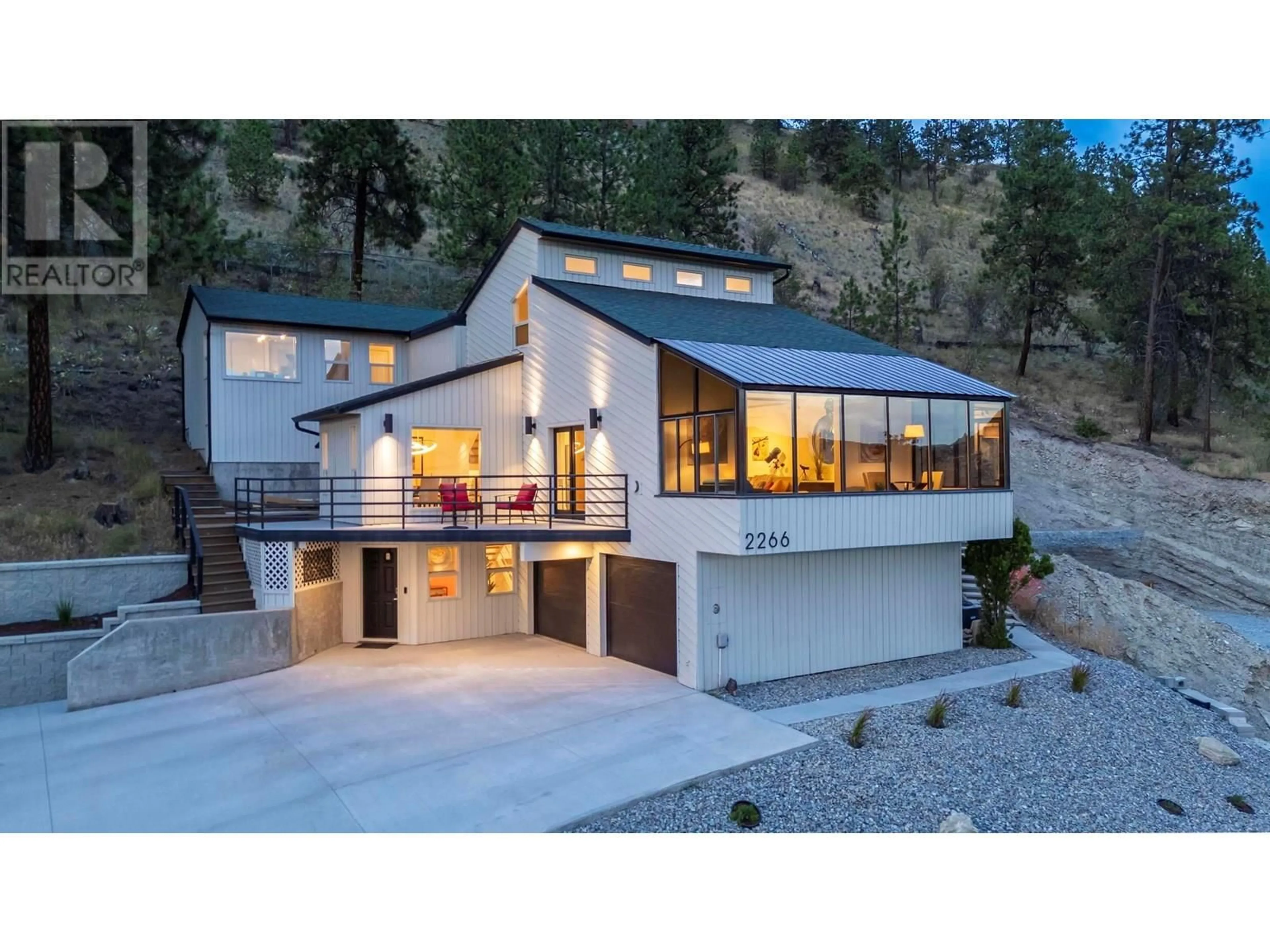 Home with vinyl exterior material, mountain view for 2266 OMINECA PLACE, Kelowna British Columbia V1V1H7