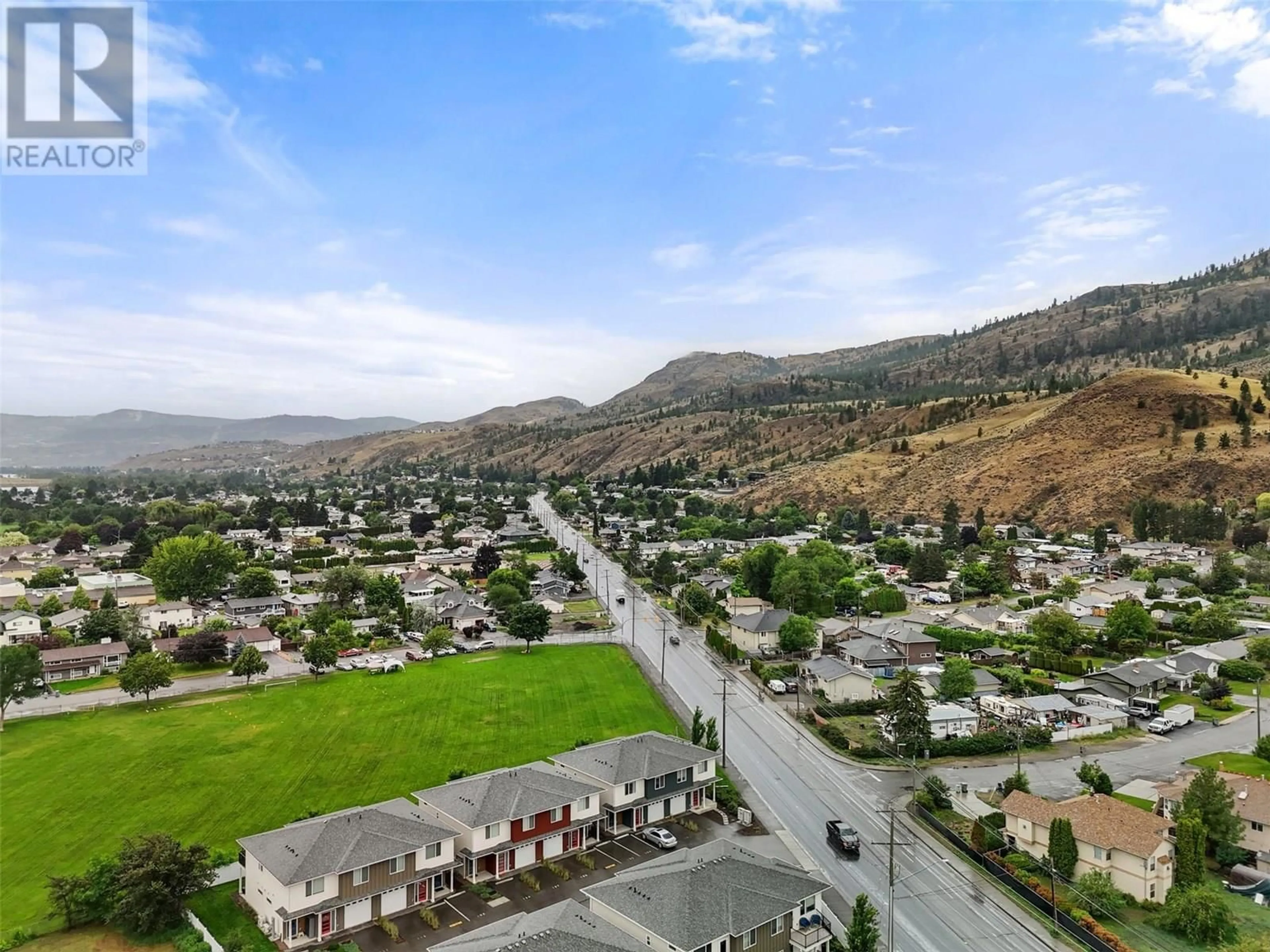 A pic from outside/outdoor area/front of a property/back of a property/a pic from drone, mountain view for 103 - 2925 WESTSYDE ROAD, Kamloops British Columbia V2B0J8
