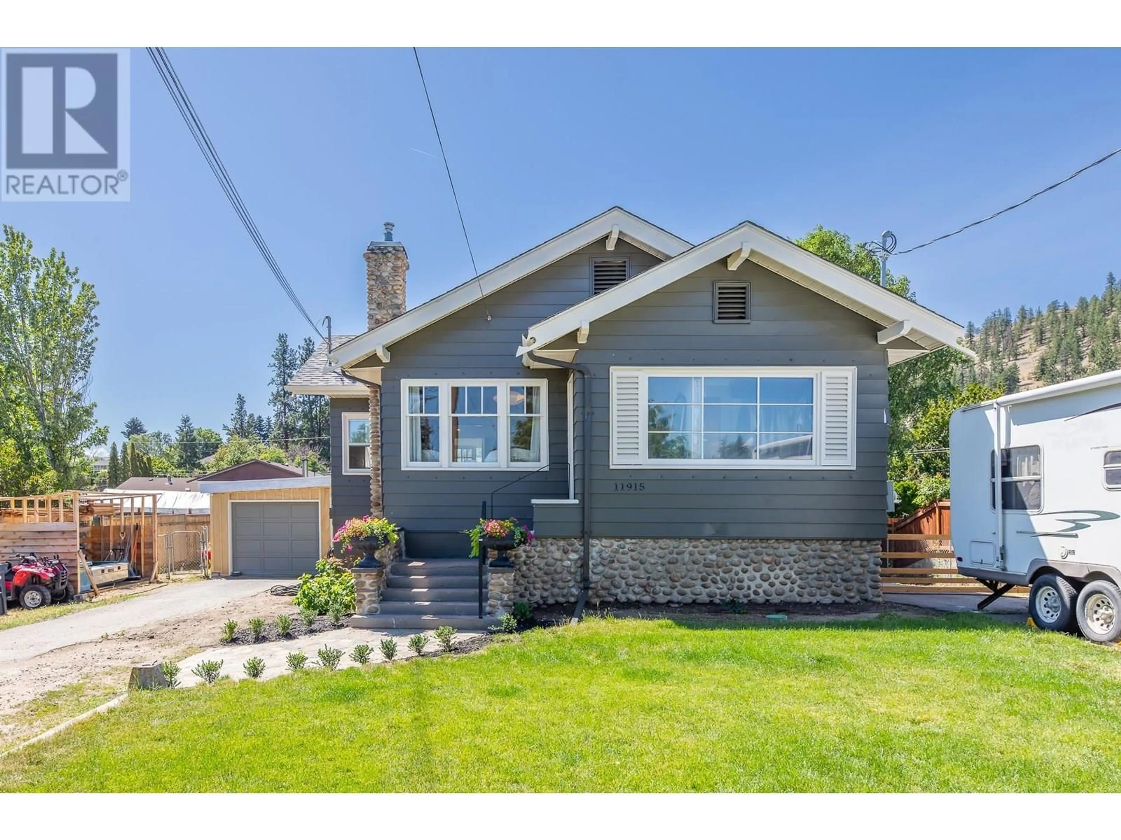 Home with vinyl exterior material, street for 11915 QUINPOOL ROAD, Summerland British Columbia V0H1Z5