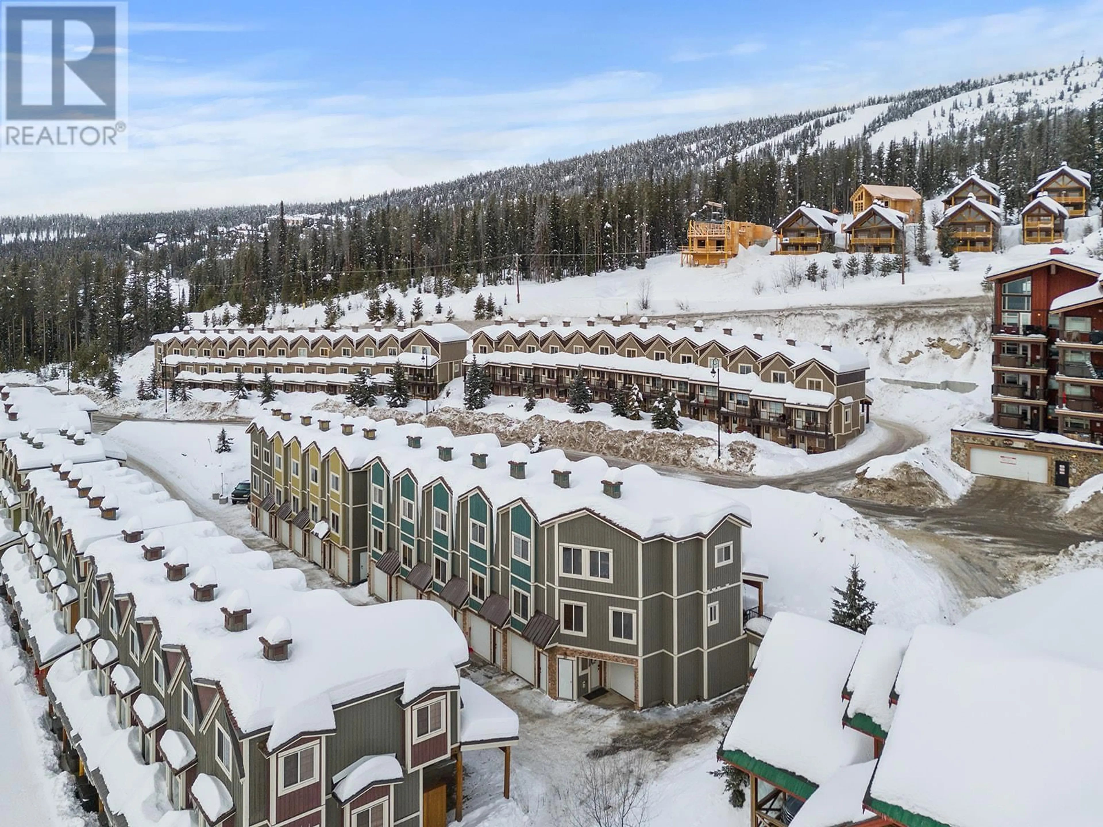 A pic from outside/outdoor area/front of a property/back of a property/a pic from drone, mountain view for 28 - 5015 SNOWBIRD WAY, Big White British Columbia V1P1P3