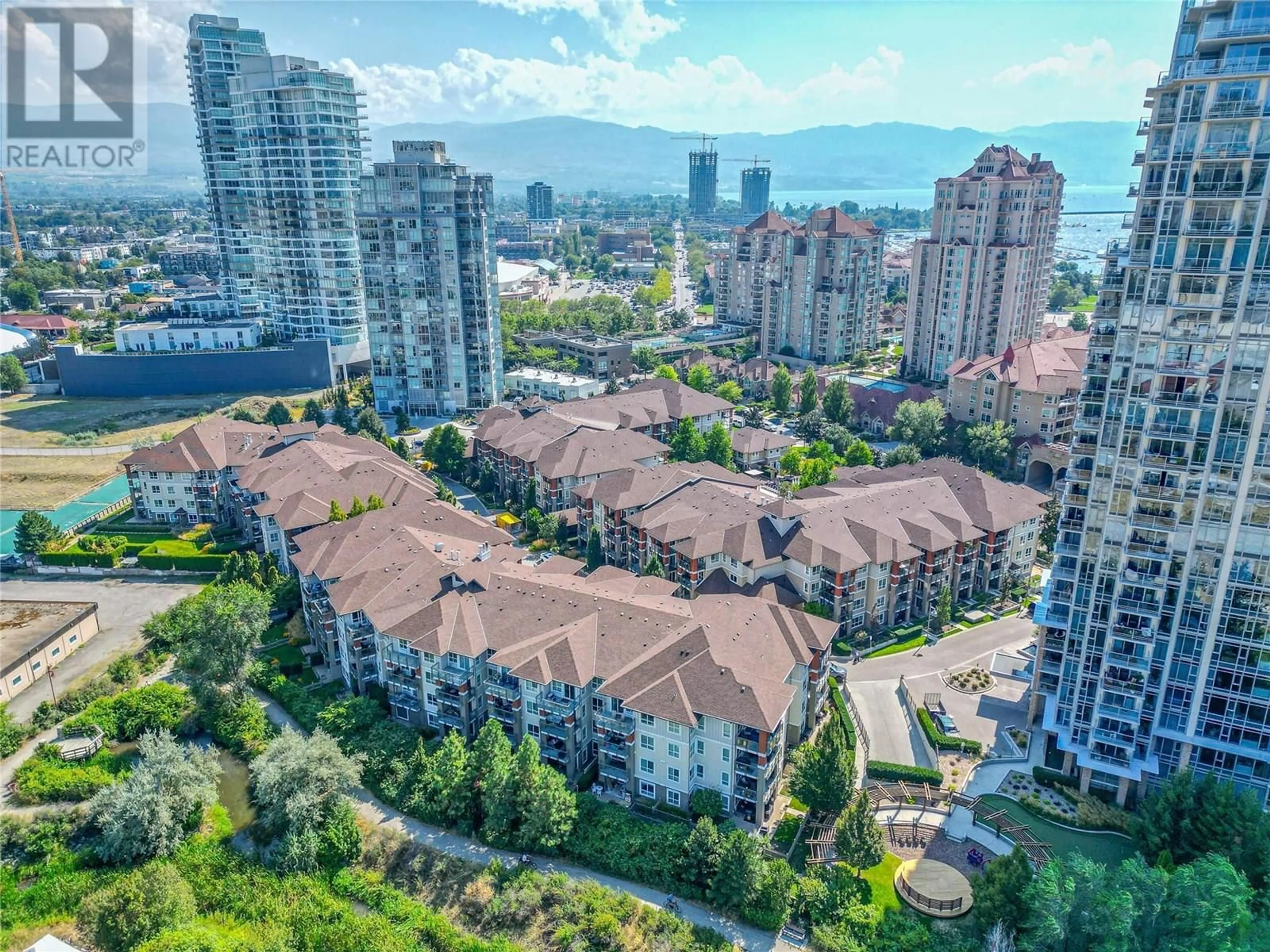 A pic from outside/outdoor area/front of a property/back of a property/a pic from drone, city buildings view from balcony for 105 - 1093 SUNSET DRIVE, Kelowna British Columbia V1Y9Z4