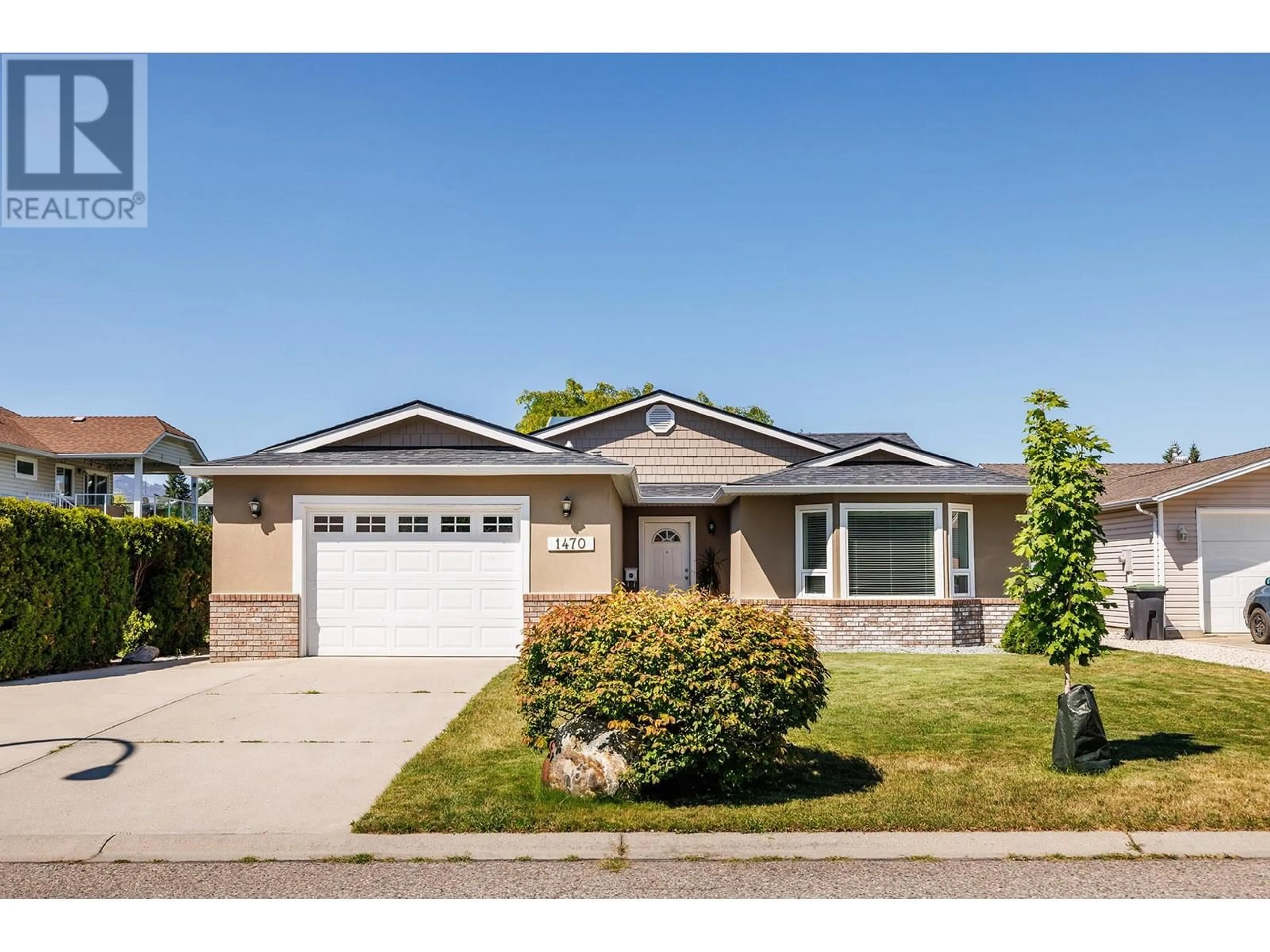 Home with brick exterior material, street for 1470 NELSON PLACE, Kelowna British Columbia V1Y9H5