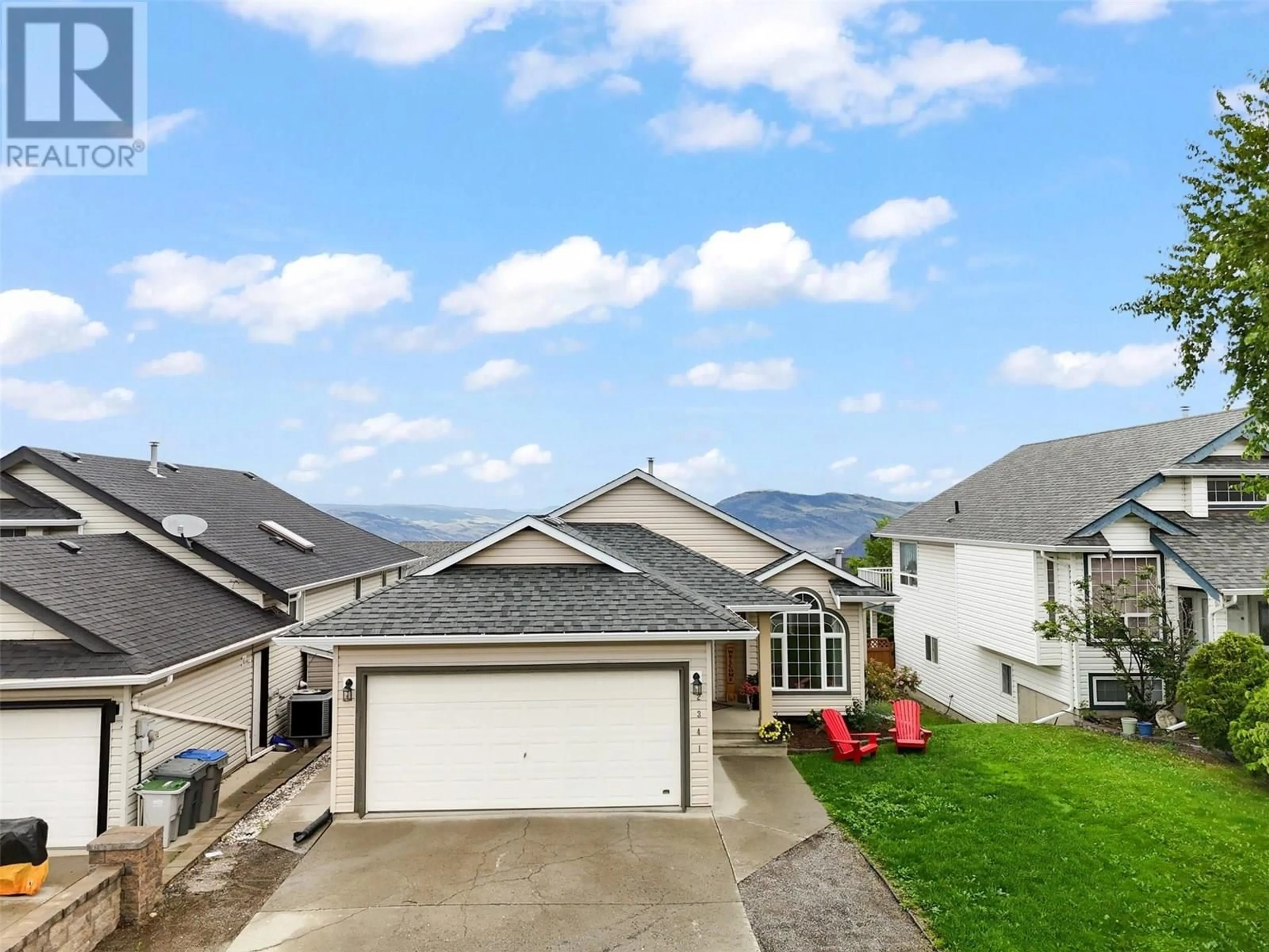 A pic from outside/outdoor area/front of a property/back of a property/a pic from drone, mountain view for 2341 ABBEYGLEN WAY, Kamloops British Columbia V1S1V7