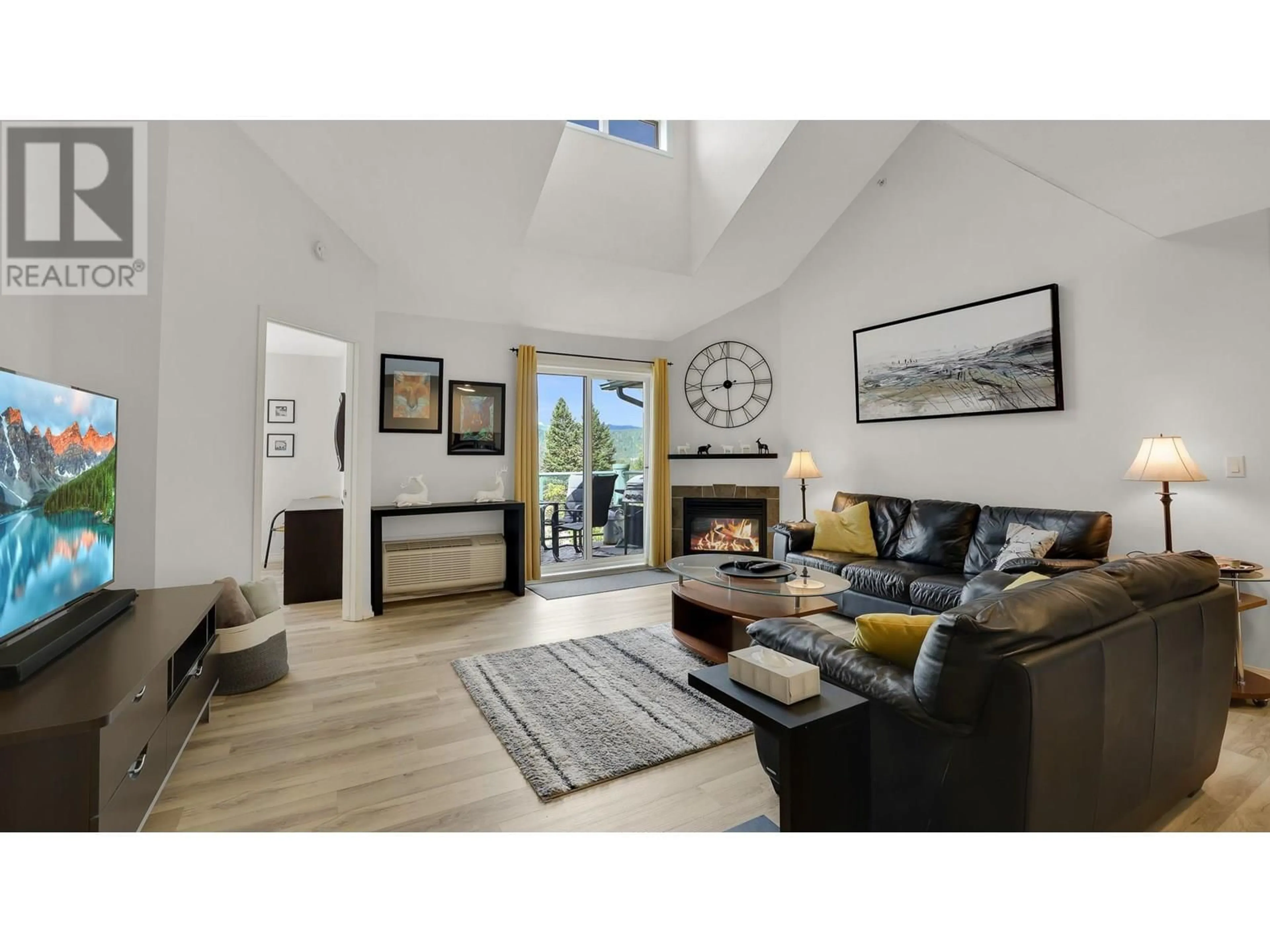 Living room with furniture, wood/laminate floor for 307 - 4765 FORSTERS LANDING ROAD, Radium Hot Springs British Columbia V0A1M0