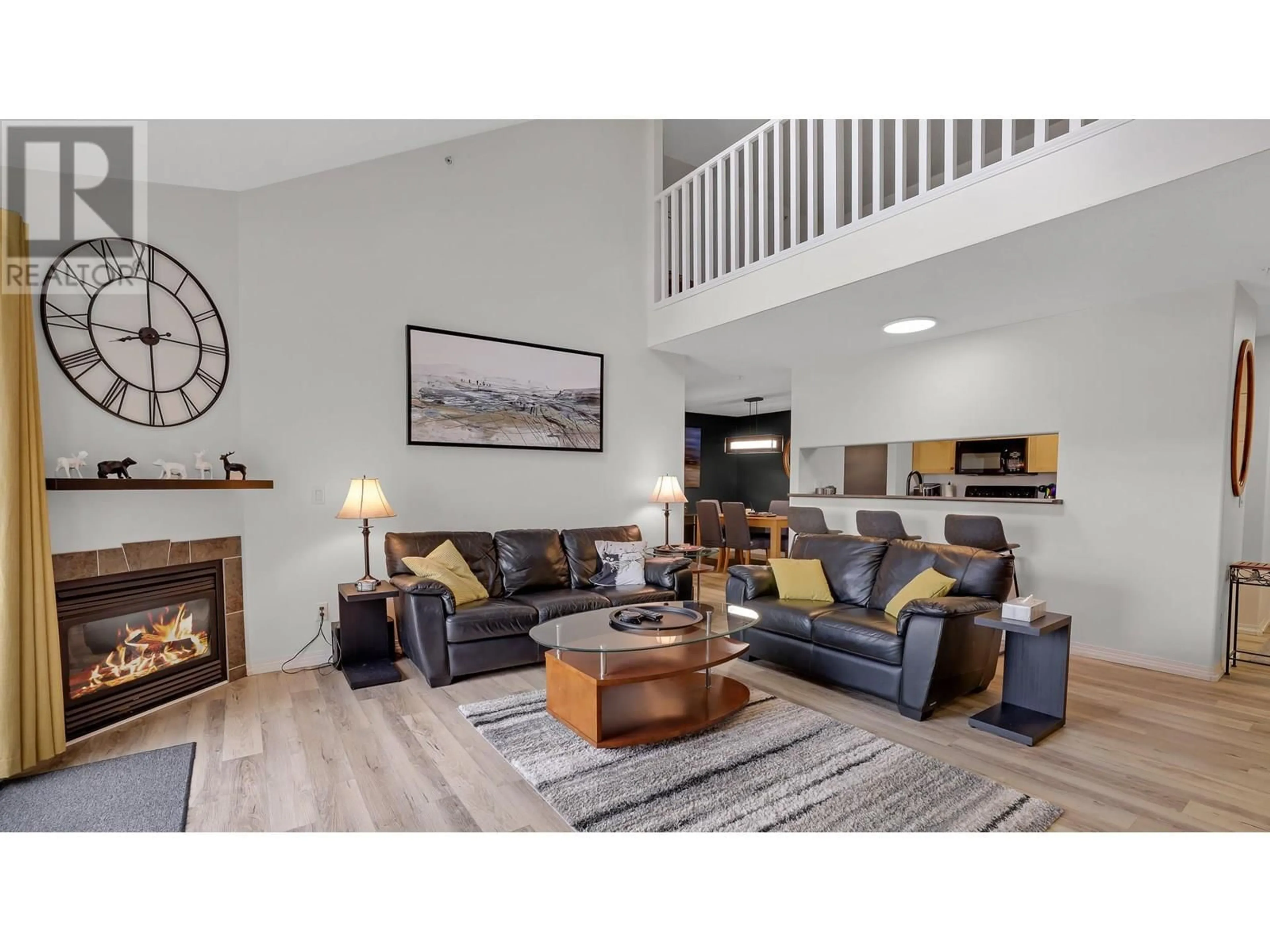 Living room with furniture, wood/laminate floor for 307 - 4765 FORSTERS LANDING ROAD, Radium Hot Springs British Columbia V0A1M0