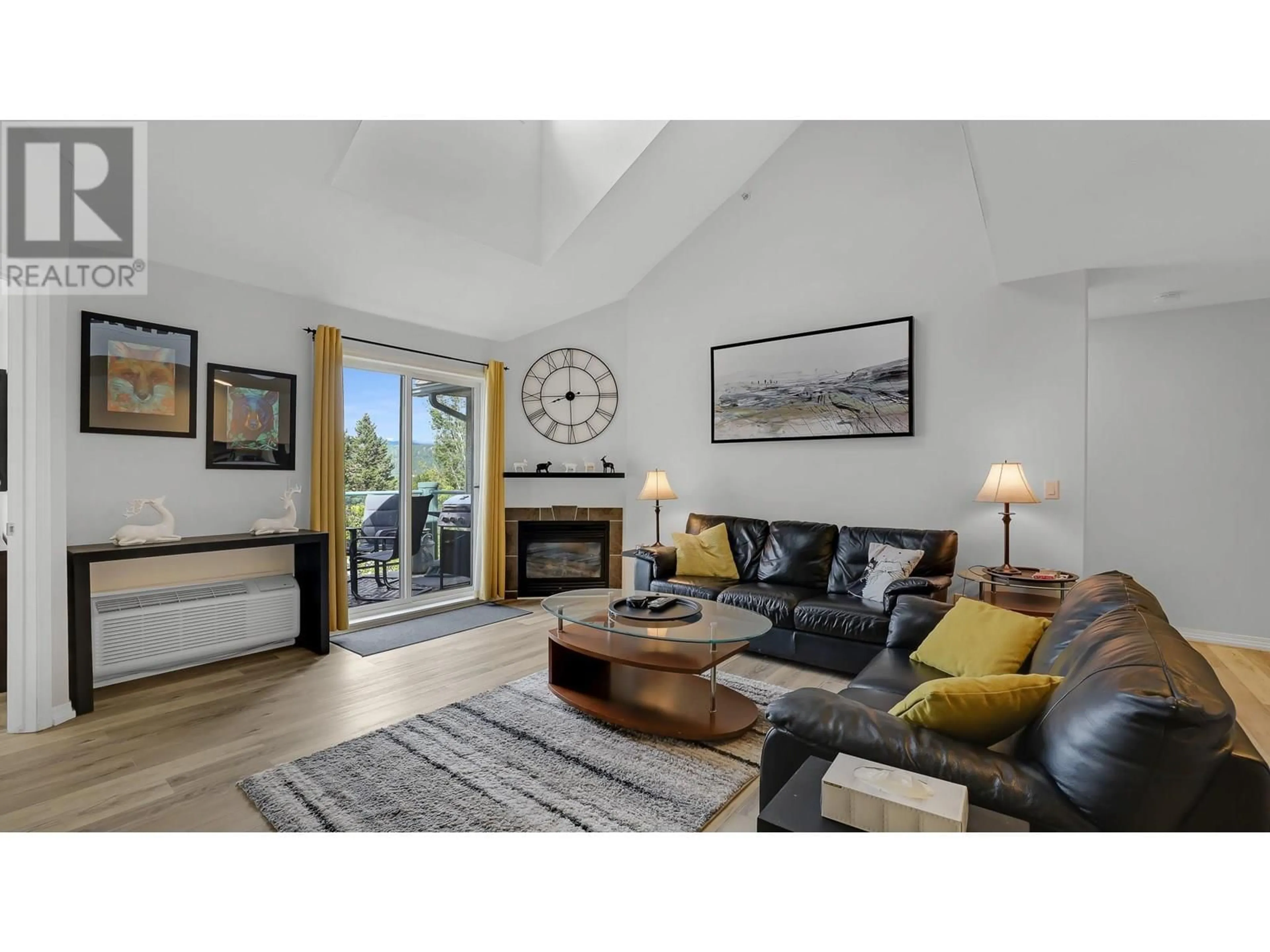 Living room with furniture, wood/laminate floor for 307 - 4765 FORSTERS LANDING ROAD, Radium Hot Springs British Columbia V0A1M0