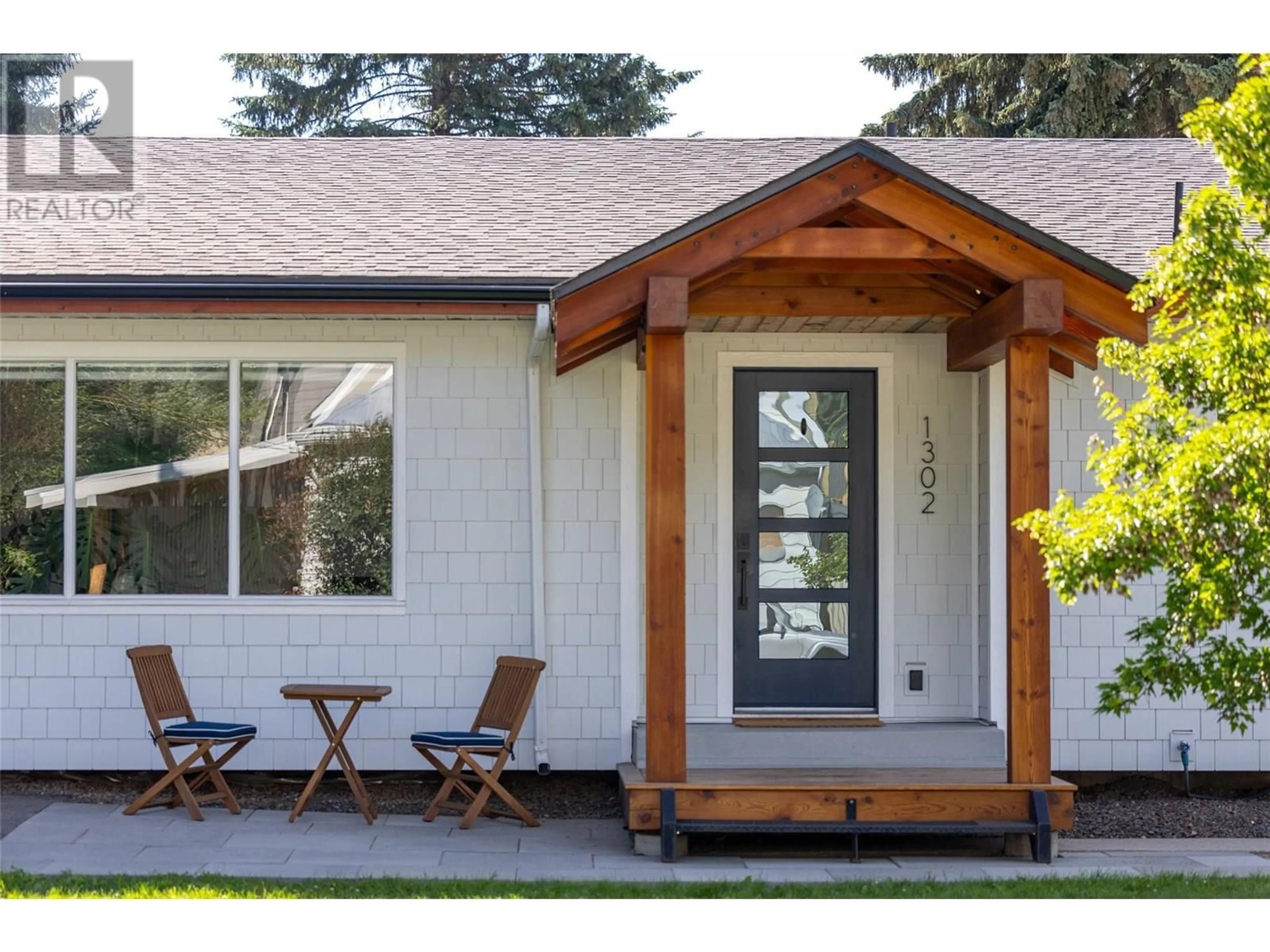 Home with vinyl exterior material, street for 1302 10TH AVENUE, Fernie British Columbia V0B1M0
