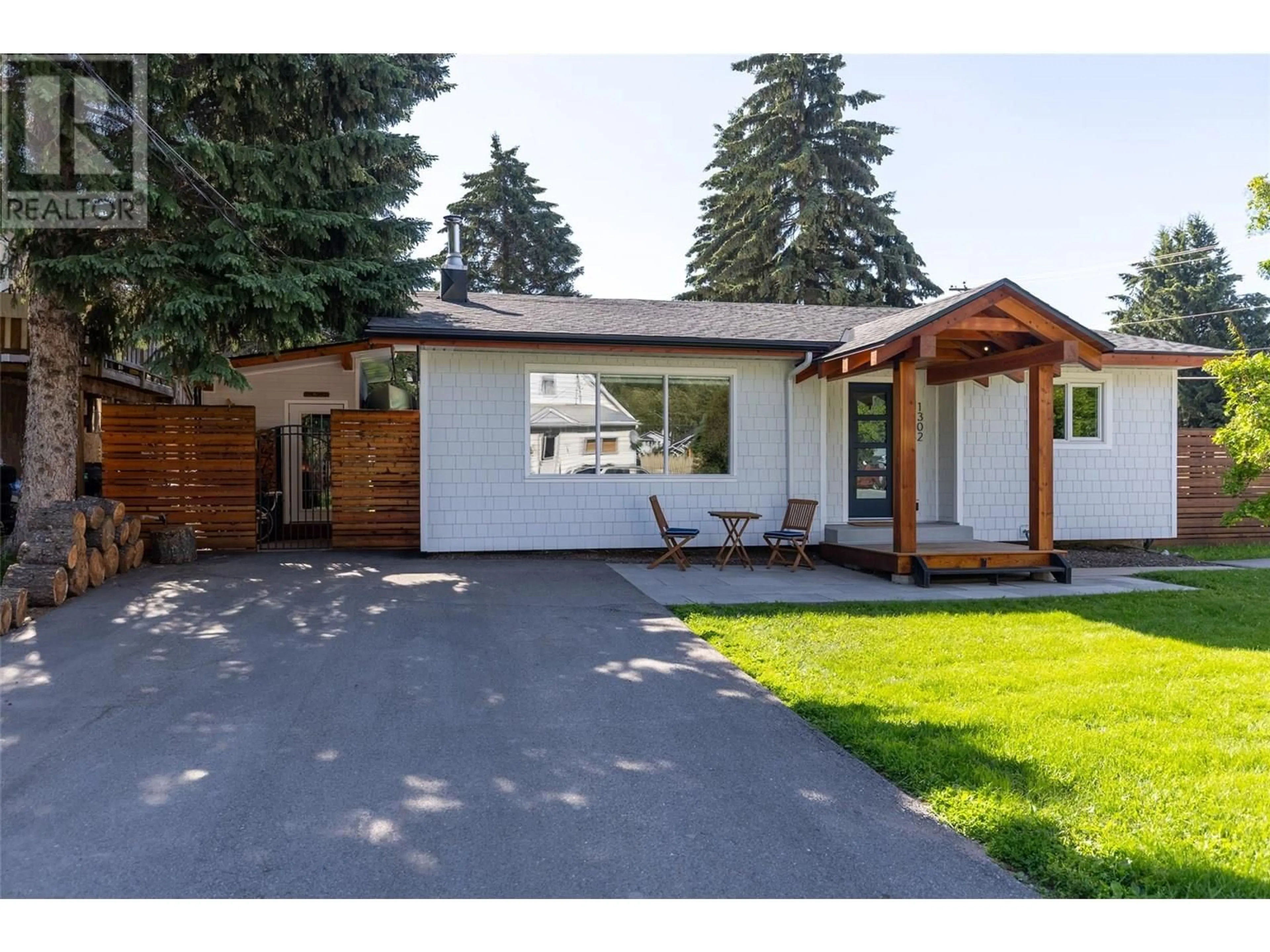 Home with vinyl exterior material, street for 1302 10TH AVENUE, Fernie British Columbia V0B1M0