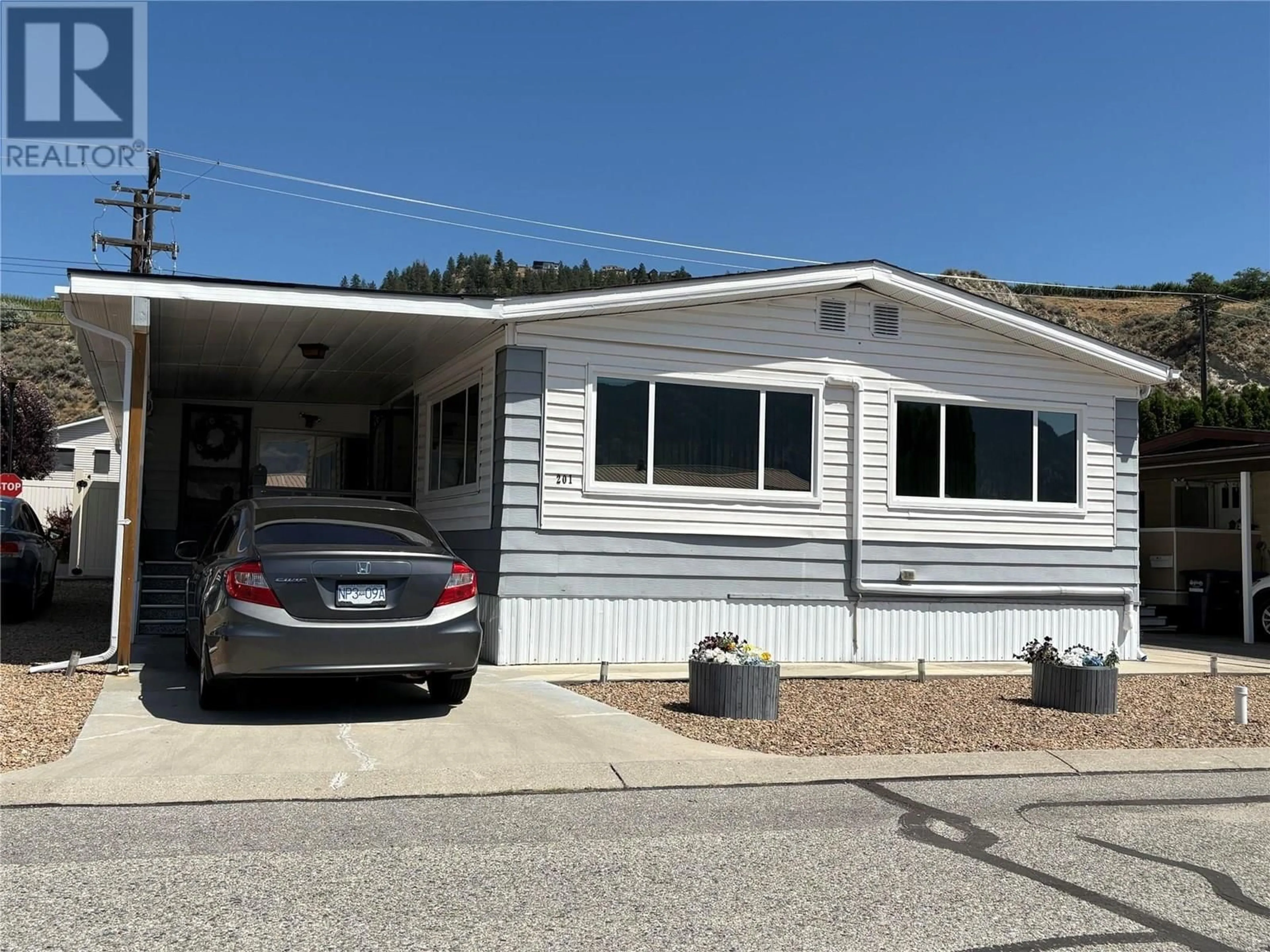Home with vinyl exterior material, street for 201 - 3105 SOUTH MAIN STREET, Penticton British Columbia V2A5G6