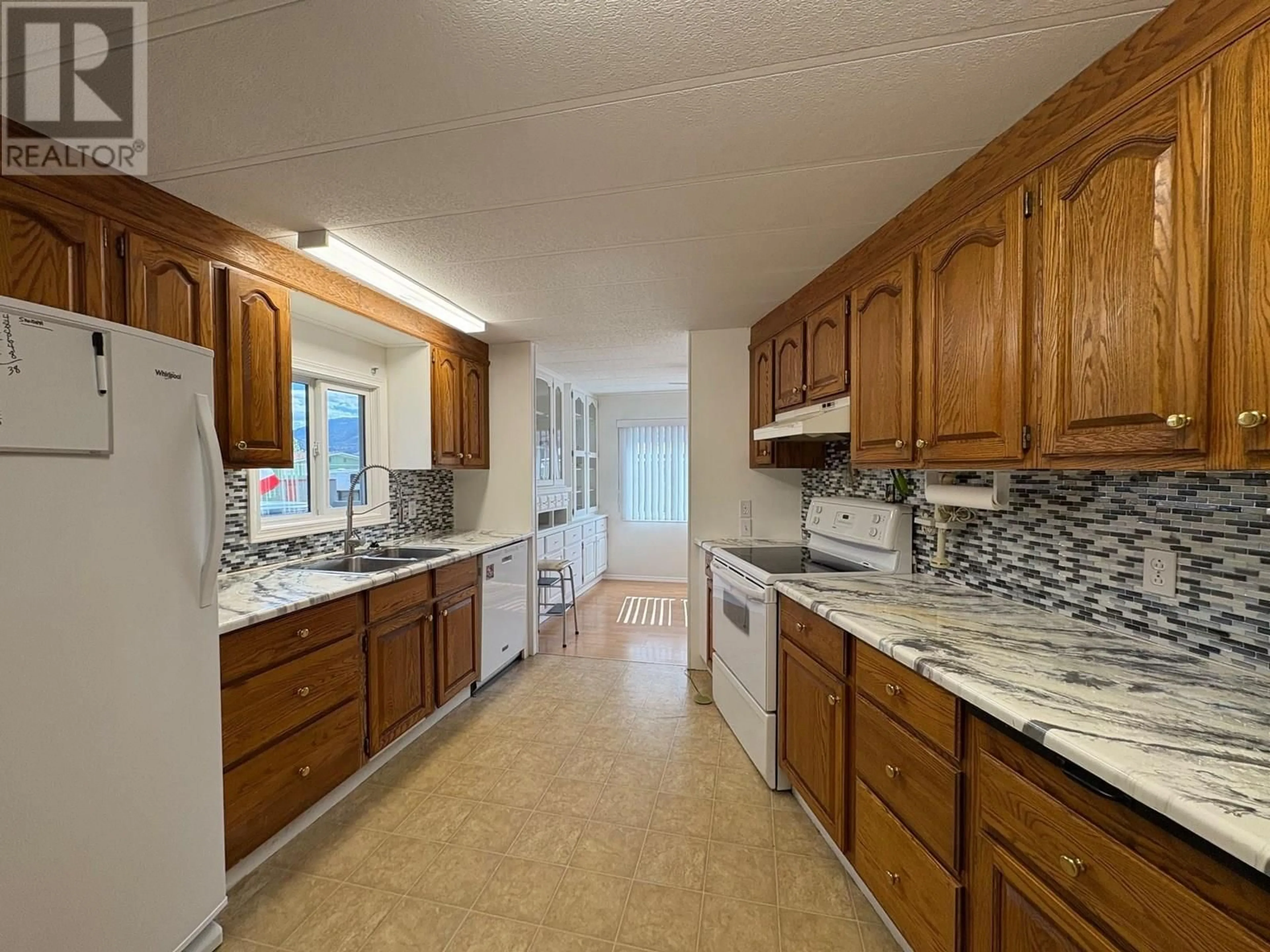Standard kitchen, ceramic/tile floor for 201 - 3105 SOUTH MAIN STREET, Penticton British Columbia V2A5G6
