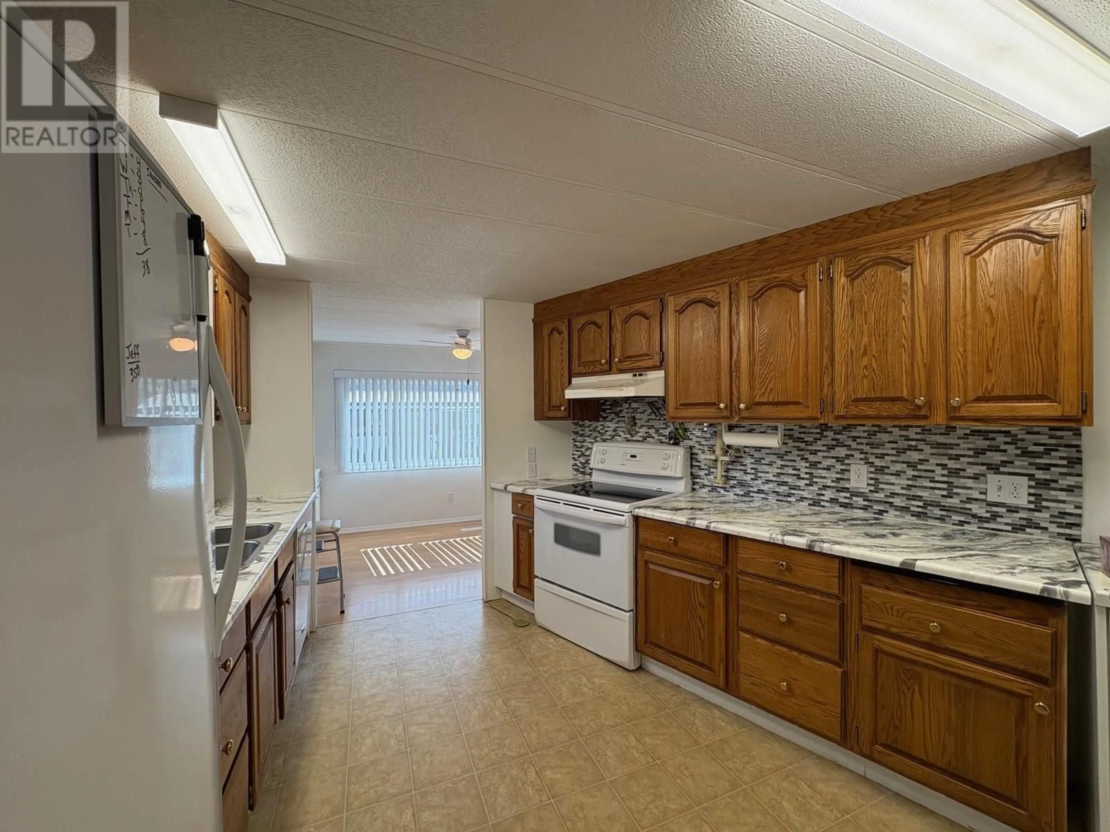 Standard kitchen, ceramic/tile floor for 201 - 3105 SOUTH MAIN STREET, Penticton British Columbia V2A5G6