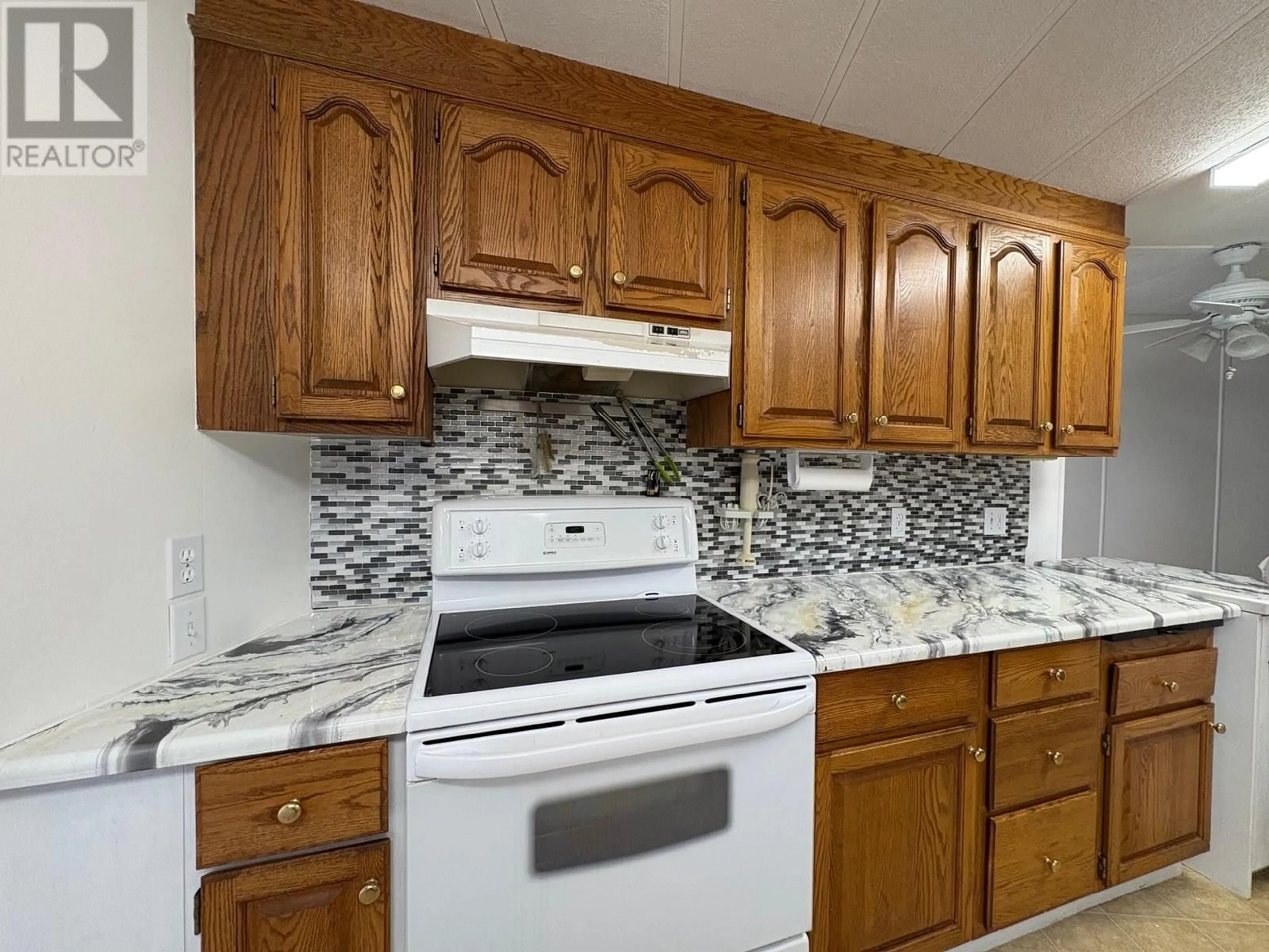 Standard kitchen, ceramic/tile floor for 201 - 3105 SOUTH MAIN STREET, Penticton British Columbia V2A5G6
