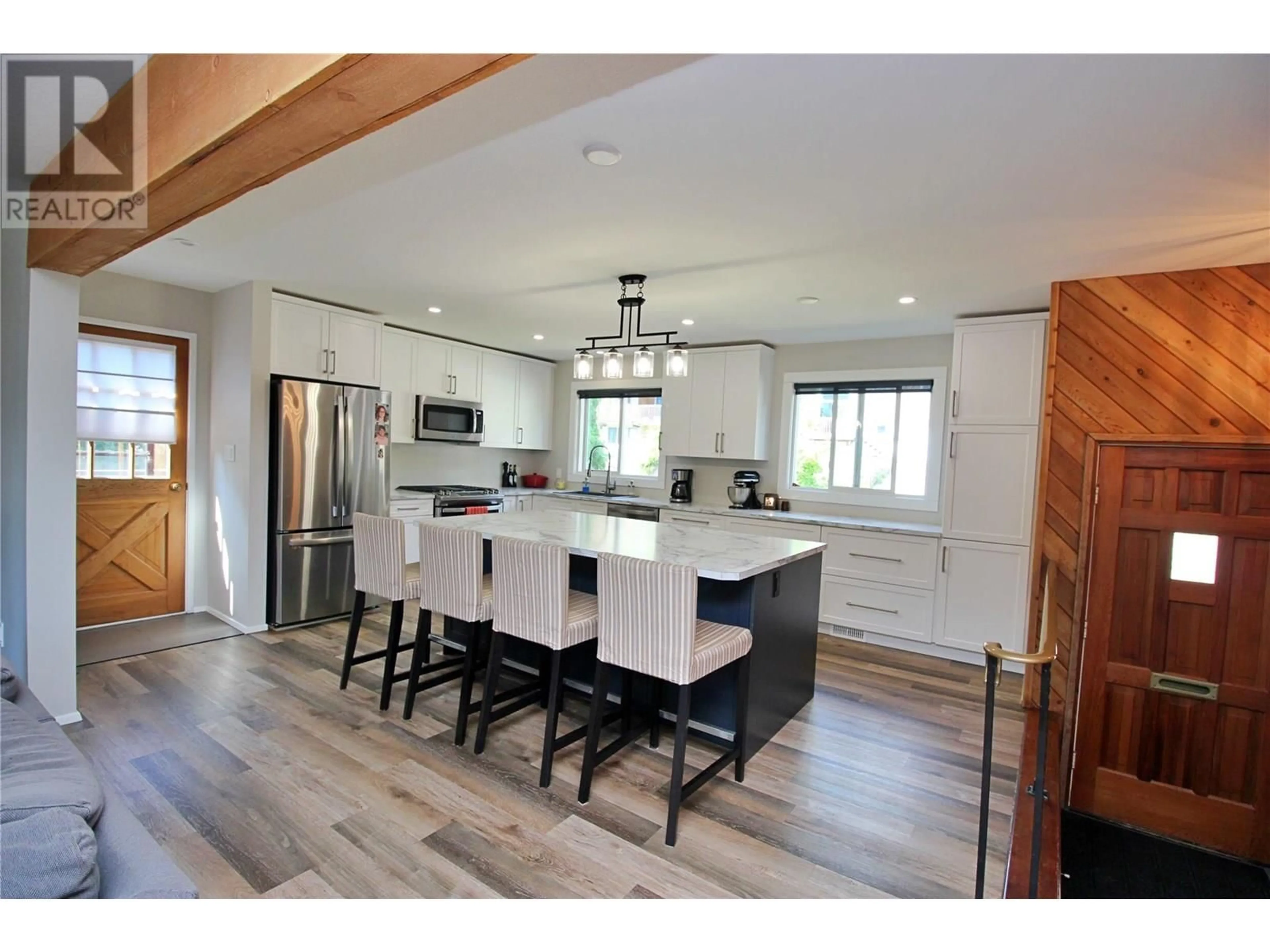 Open concept kitchen, wood/laminate floor for 2417 11TH AVENUE, Castlegar British Columbia V1N3B1