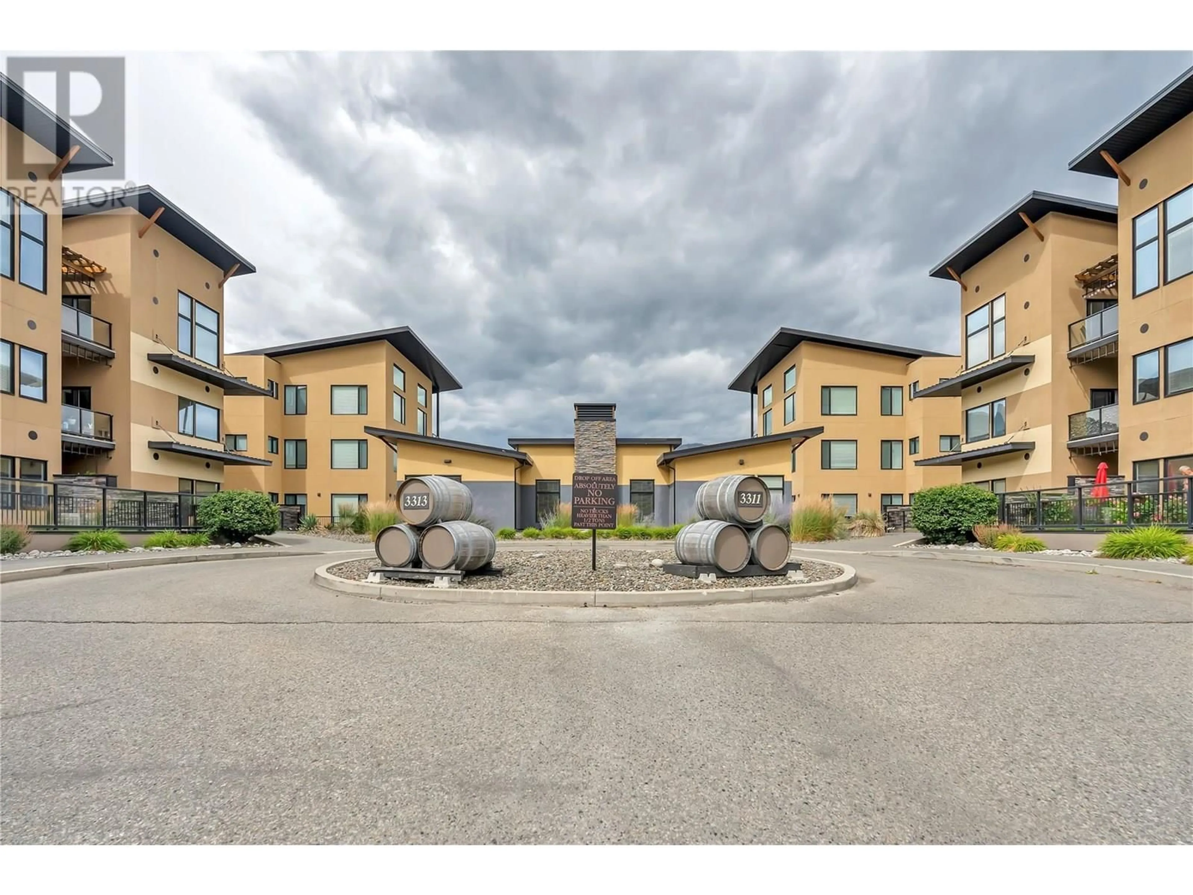 A pic from outside/outdoor area/front of a property/back of a property/a pic from drone, building for 207 - 3313 WILSON STREET, Penticton British Columbia V2A8J3