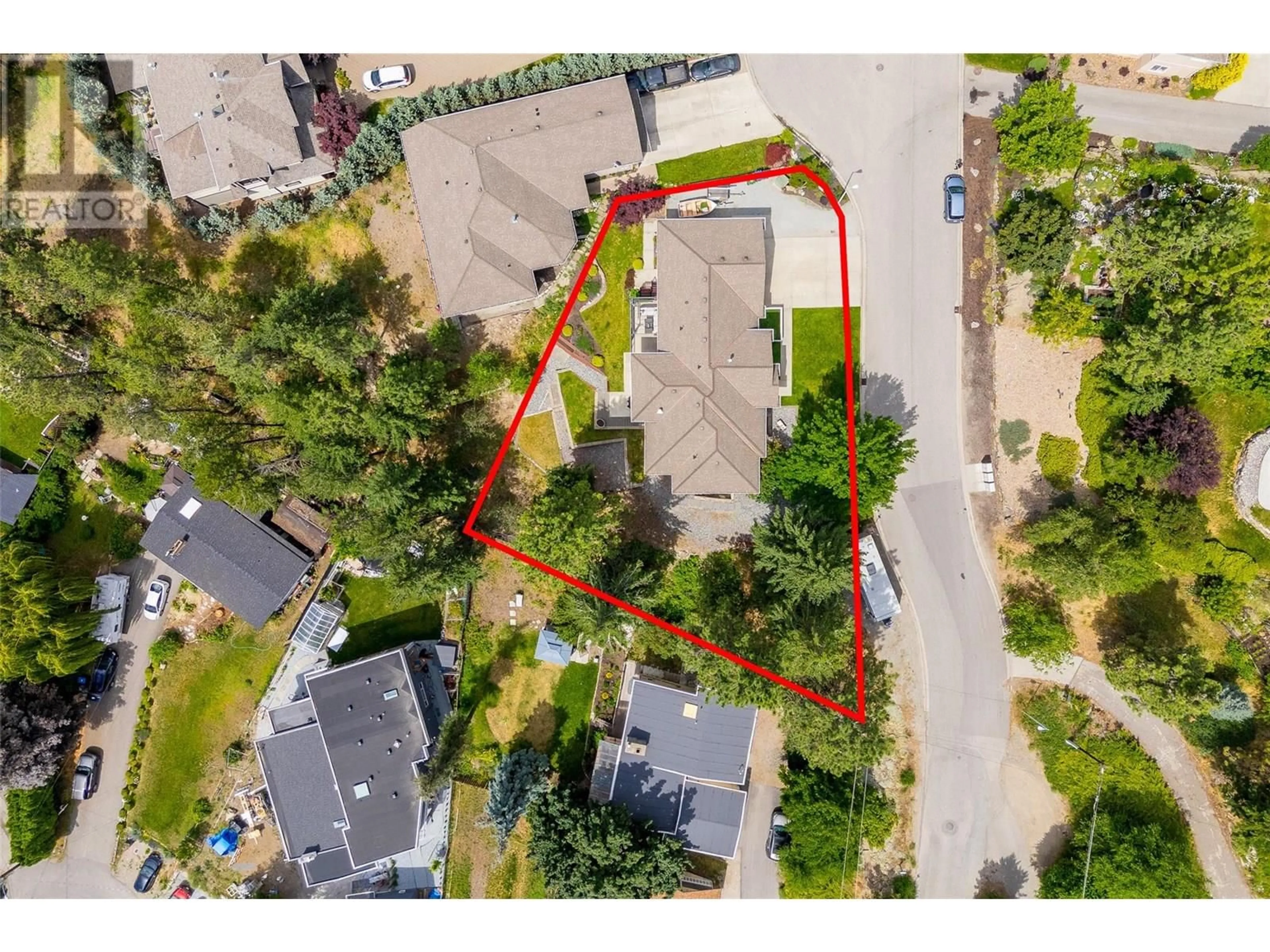 A pic from outside/outdoor area/front of a property/back of a property/a pic from drone, street for 244 TERRACE DRIVE, Kelowna British Columbia V1V2P9