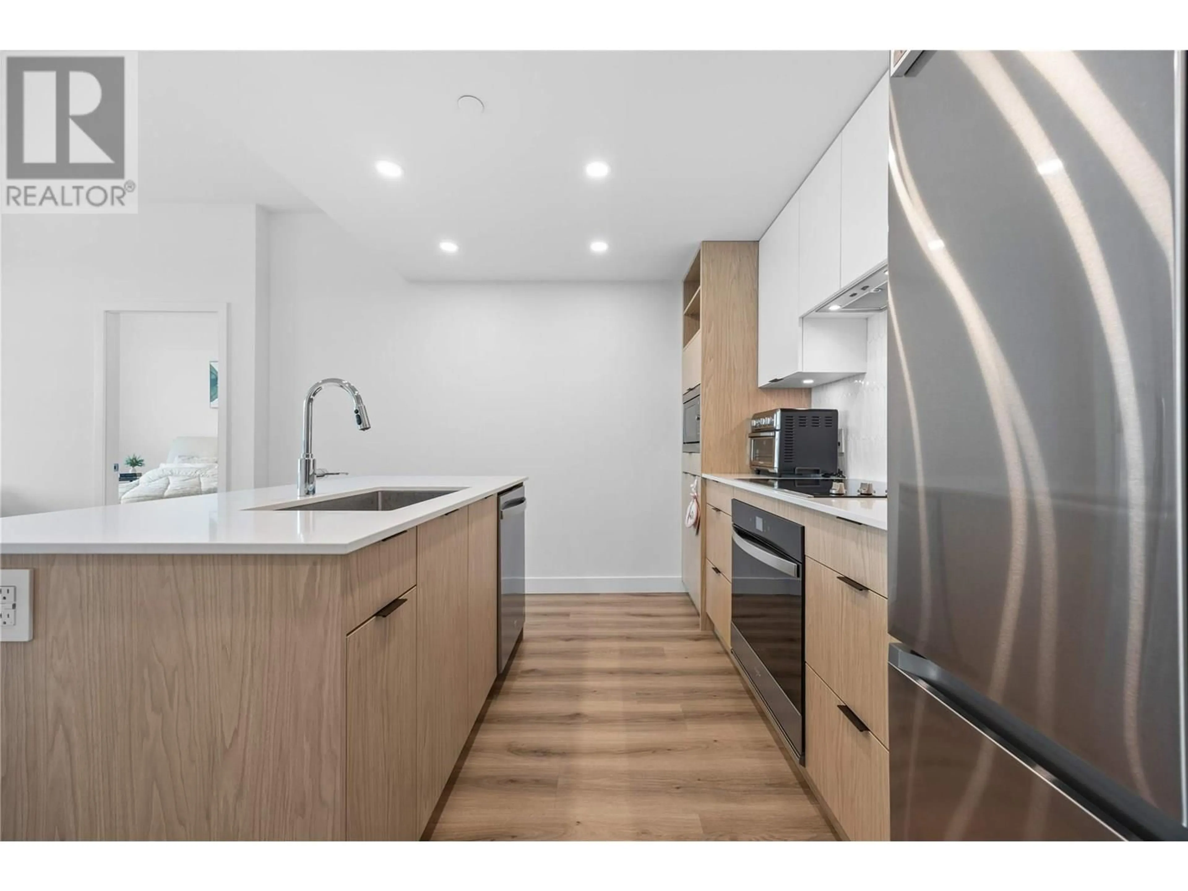 Standard kitchen, wood/laminate floor for 3201 - 1488 BERTRAM STREET, Kelowna British Columbia V1Y0M6