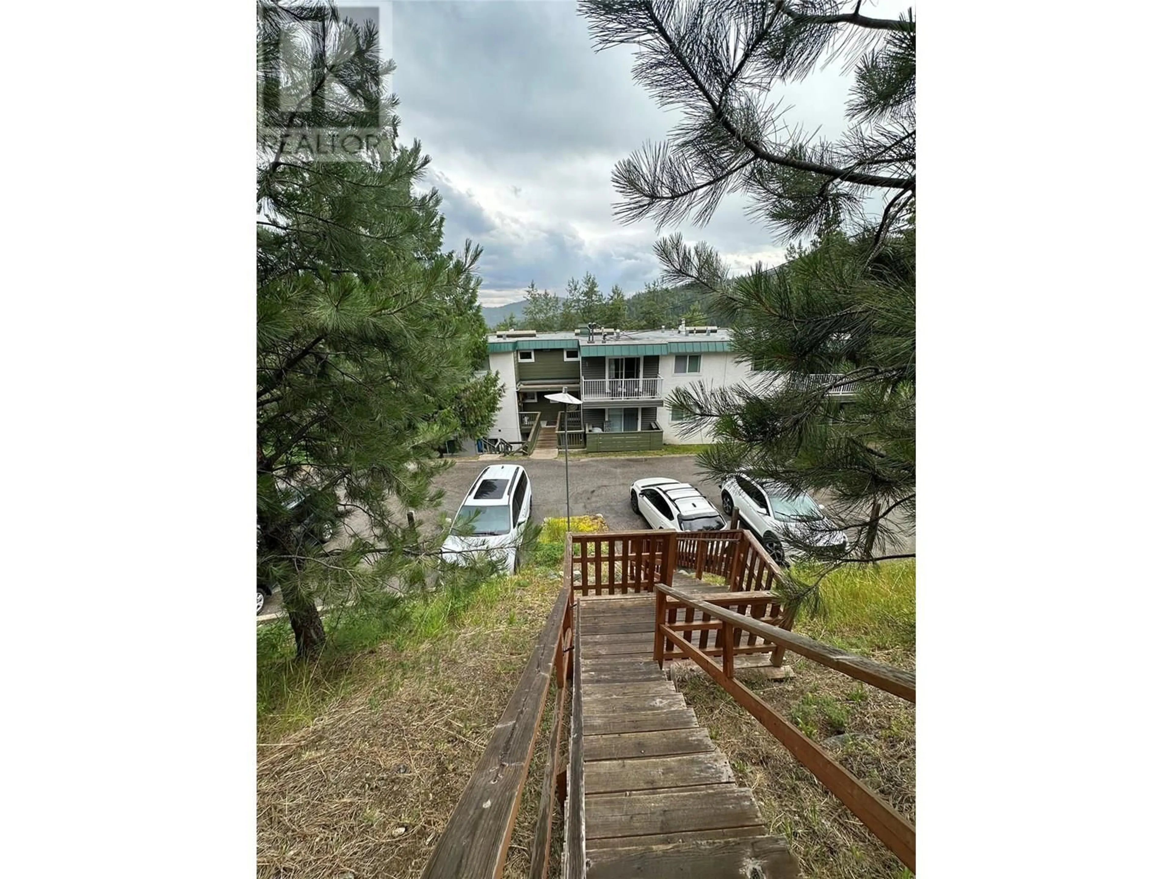 A pic from outside/outdoor area/front of a property/back of a property/a pic from drone, water/lake/river/ocean view for 308 - 1611 NICKELPLATE ROAD, Rossland British Columbia V0G1Y0