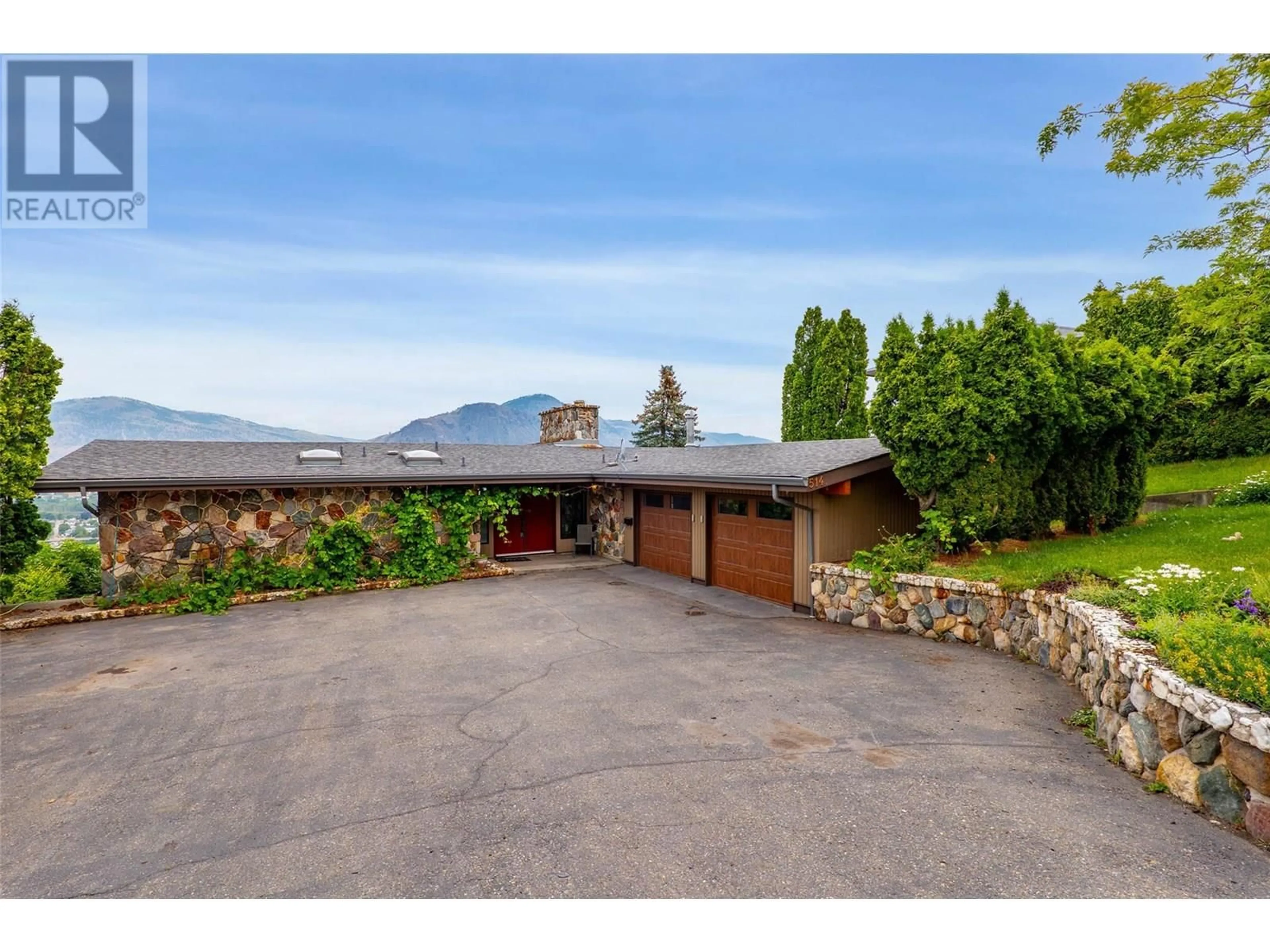 A pic from outside/outdoor area/front of a property/back of a property/a pic from drone, mountain view for 514 STRATHCONA TERRACE, Kamloops British Columbia V2C1B9