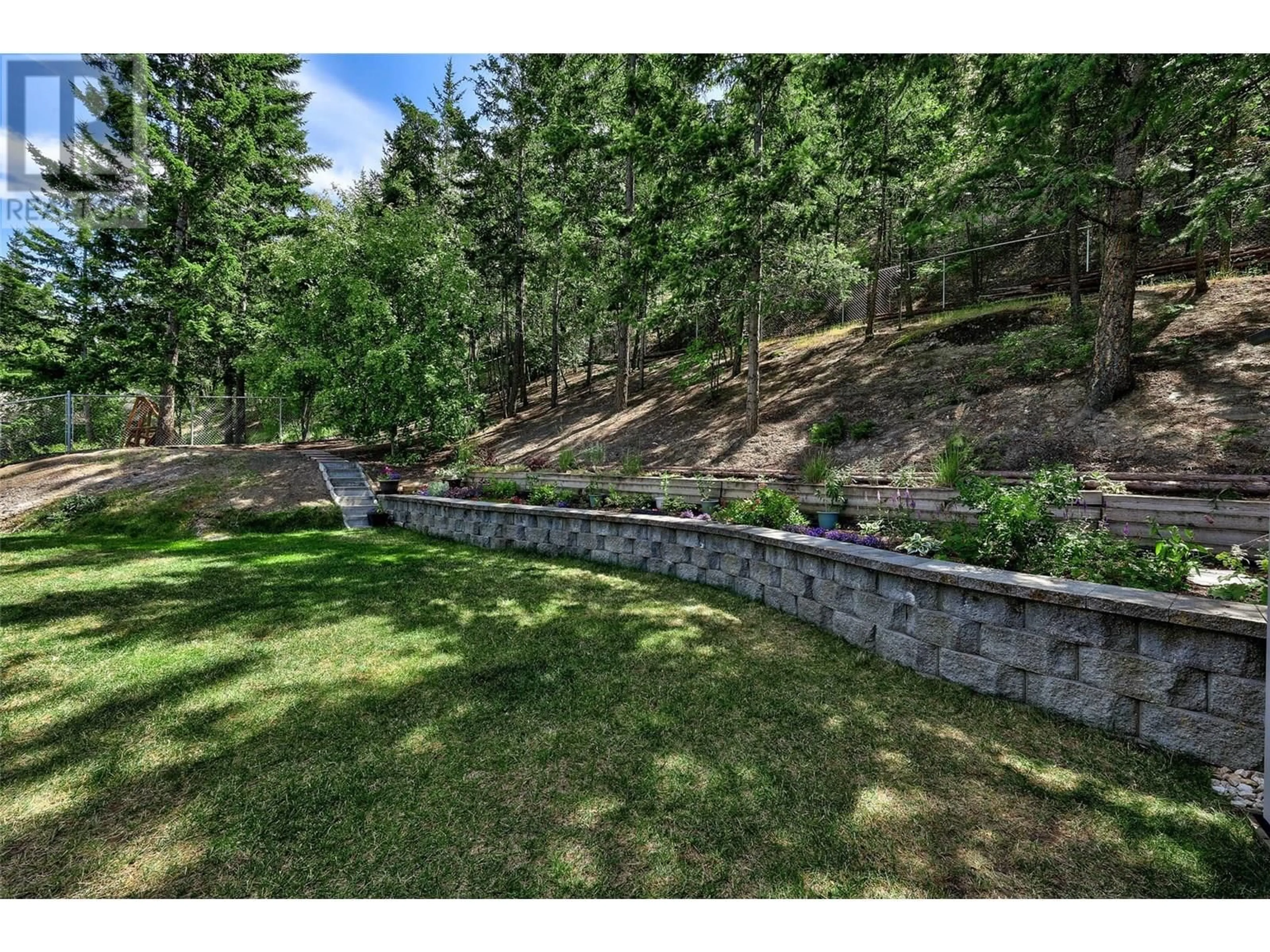 A pic from outside/outdoor area/front of a property/back of a property/a pic from drone, forest/trees view for 2761 SKEENA DRIVE, Kamloops British Columbia V2E2M9