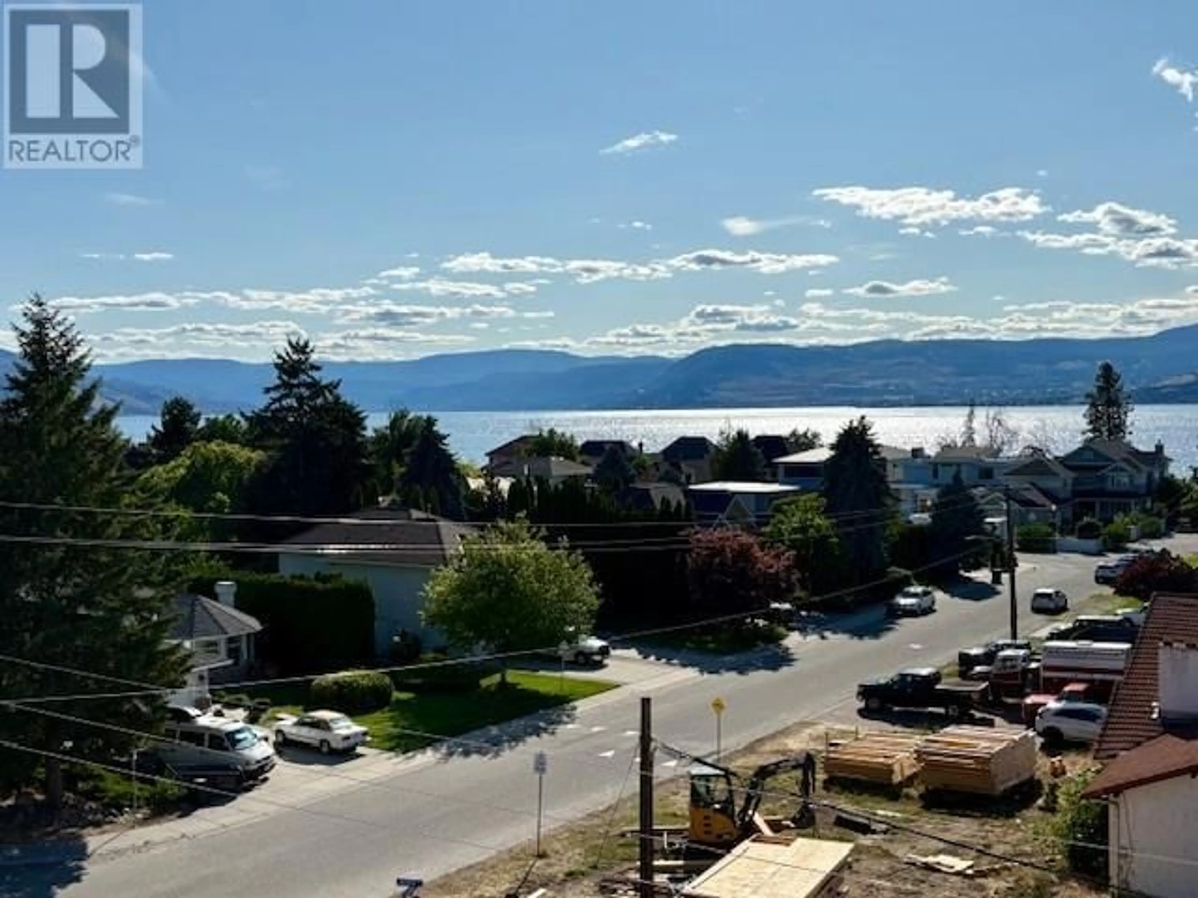 A pic from outside/outdoor area/front of a property/back of a property/a pic from drone, water/lake/river/ocean view for 3 - 4495 WALKER ROAD, Kelowna British Columbia V1W1G8