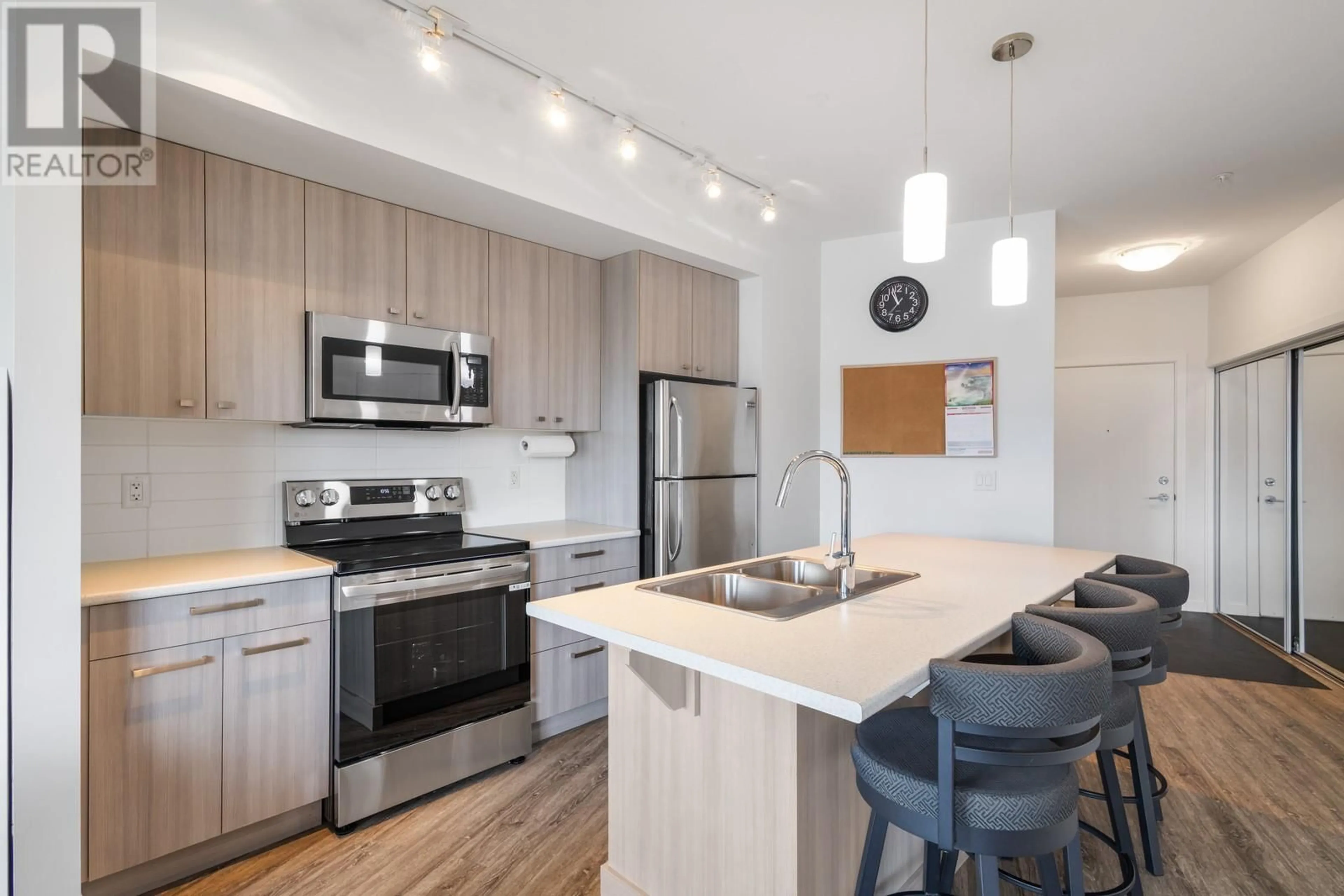 Open concept kitchen, unknown for 207 - 935 ACADEMY WAY, Kelowna British Columbia V1V3C9