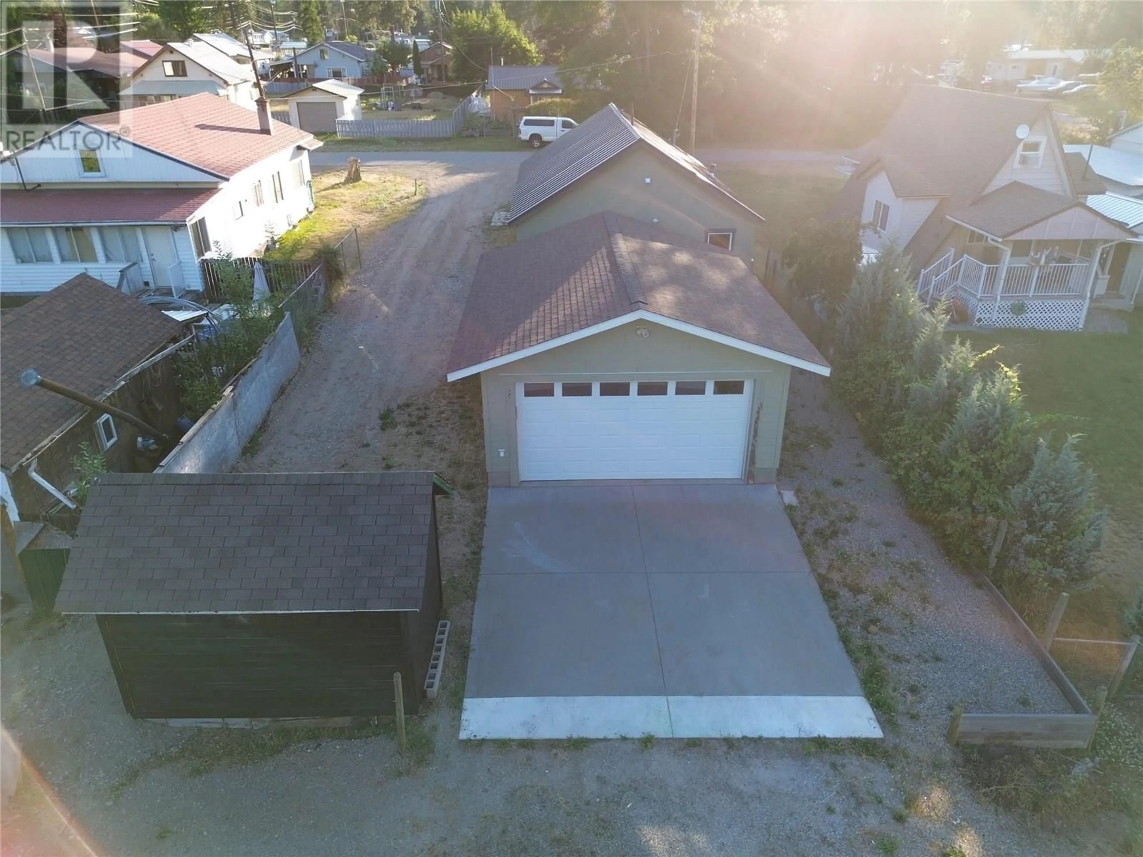 A pic from outside/outdoor area/front of a property/back of a property/a pic from drone, street for 1640 ODE ROAD, Christina Lake British Columbia V0H1E0