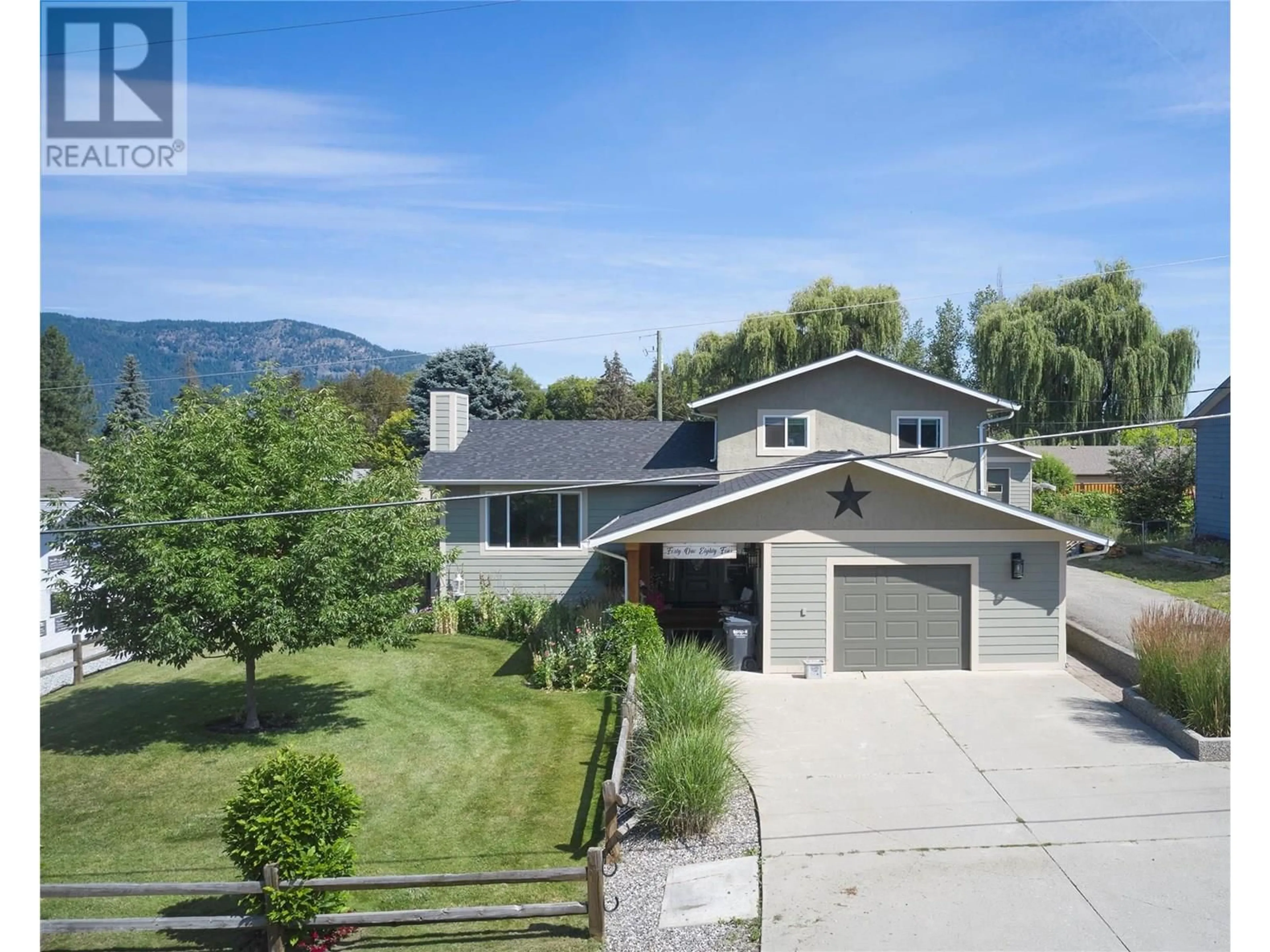 A pic from outside/outdoor area/front of a property/back of a property/a pic from drone, mountain view for 4184 BIRCH DRIVE, Spallumcheen British Columbia V0E1B6