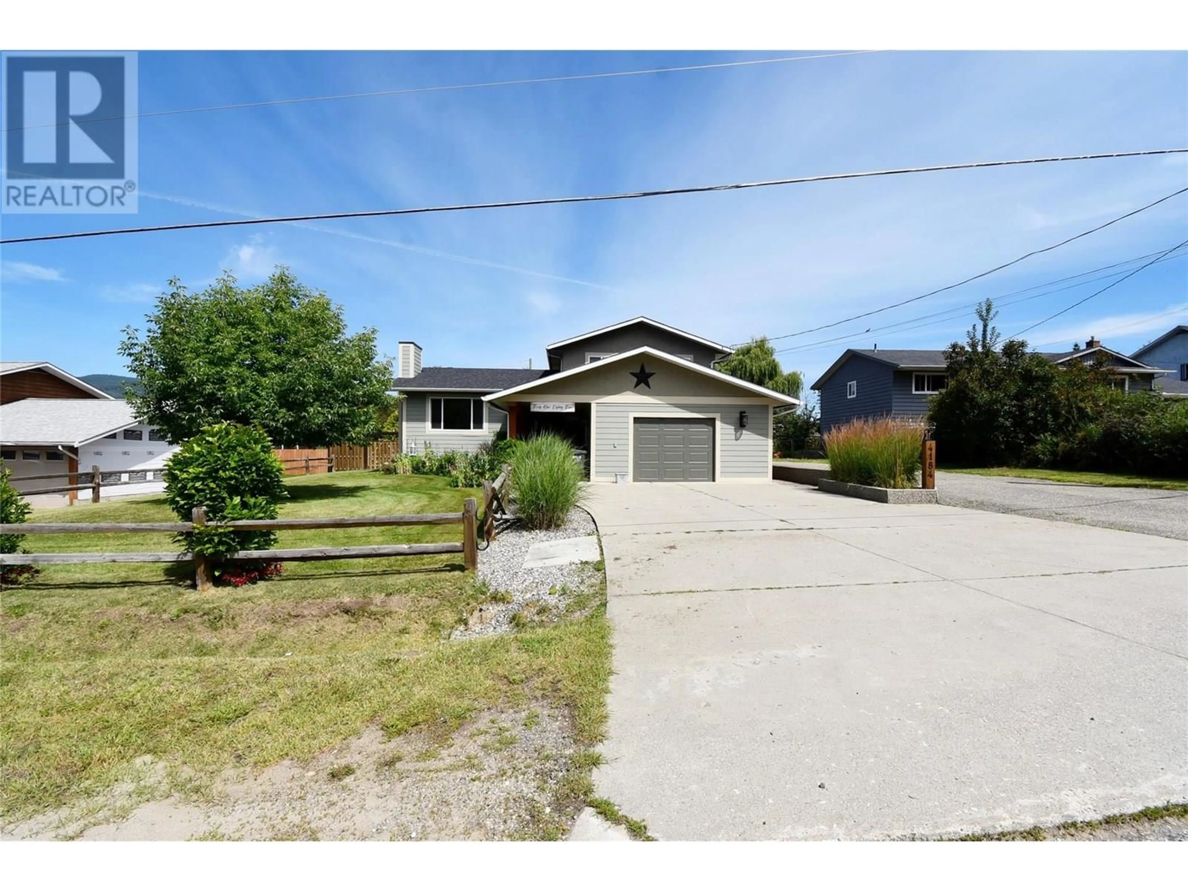 A pic from outside/outdoor area/front of a property/back of a property/a pic from drone, street for 4184 BIRCH DRIVE, Spallumcheen British Columbia V0E1B6