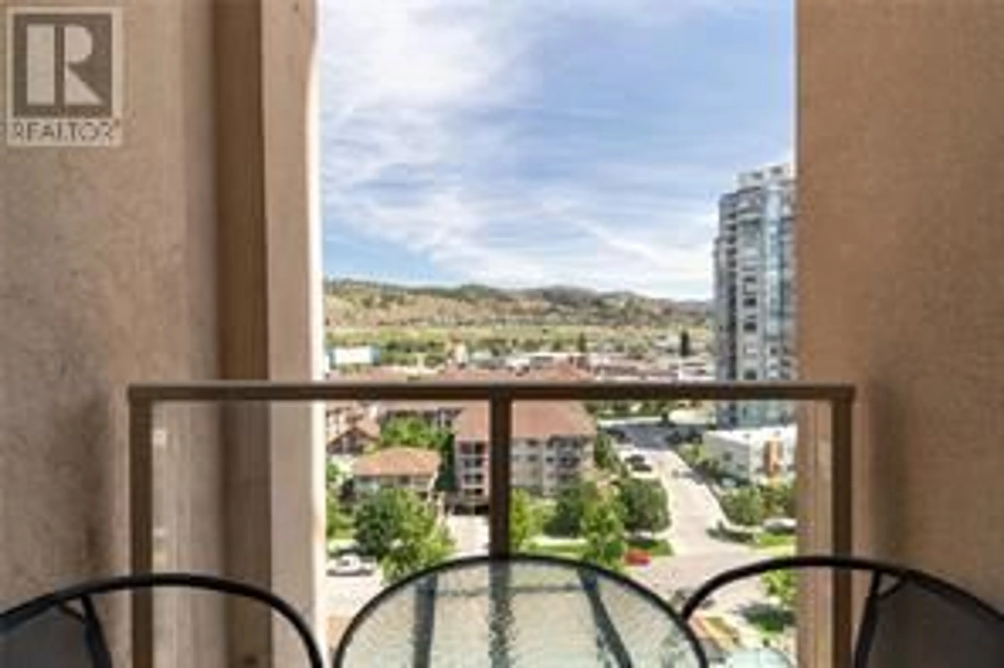 Balcony in the apartment, city buildings view from balcony for 1104 - 1128 SUNSET DRIVE, Kelowna British Columbia V1Y9W7