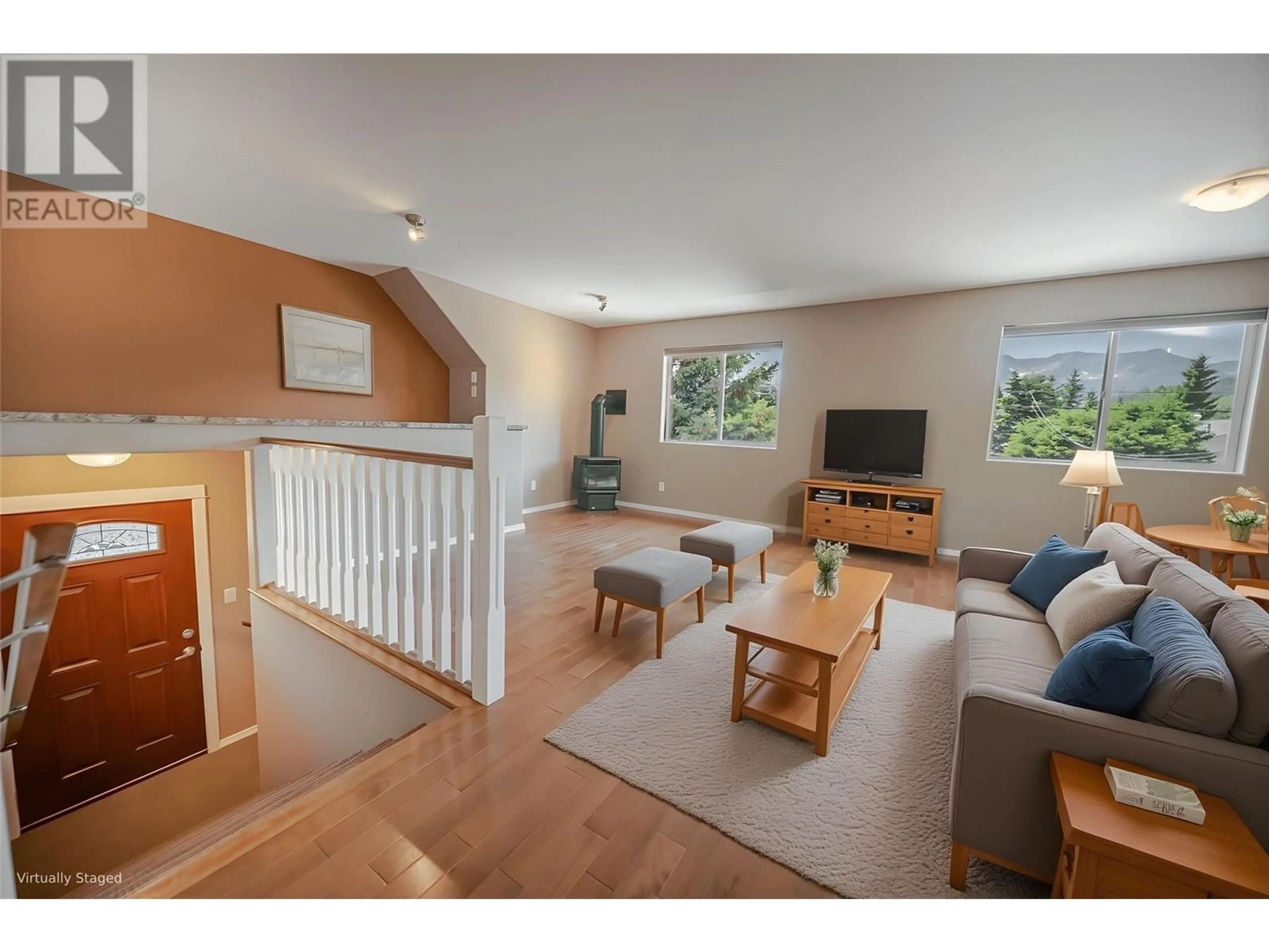 Living room with furniture, wood/laminate floor for 1302 11TH AVENUE, Fernie British Columbia V0B1M0