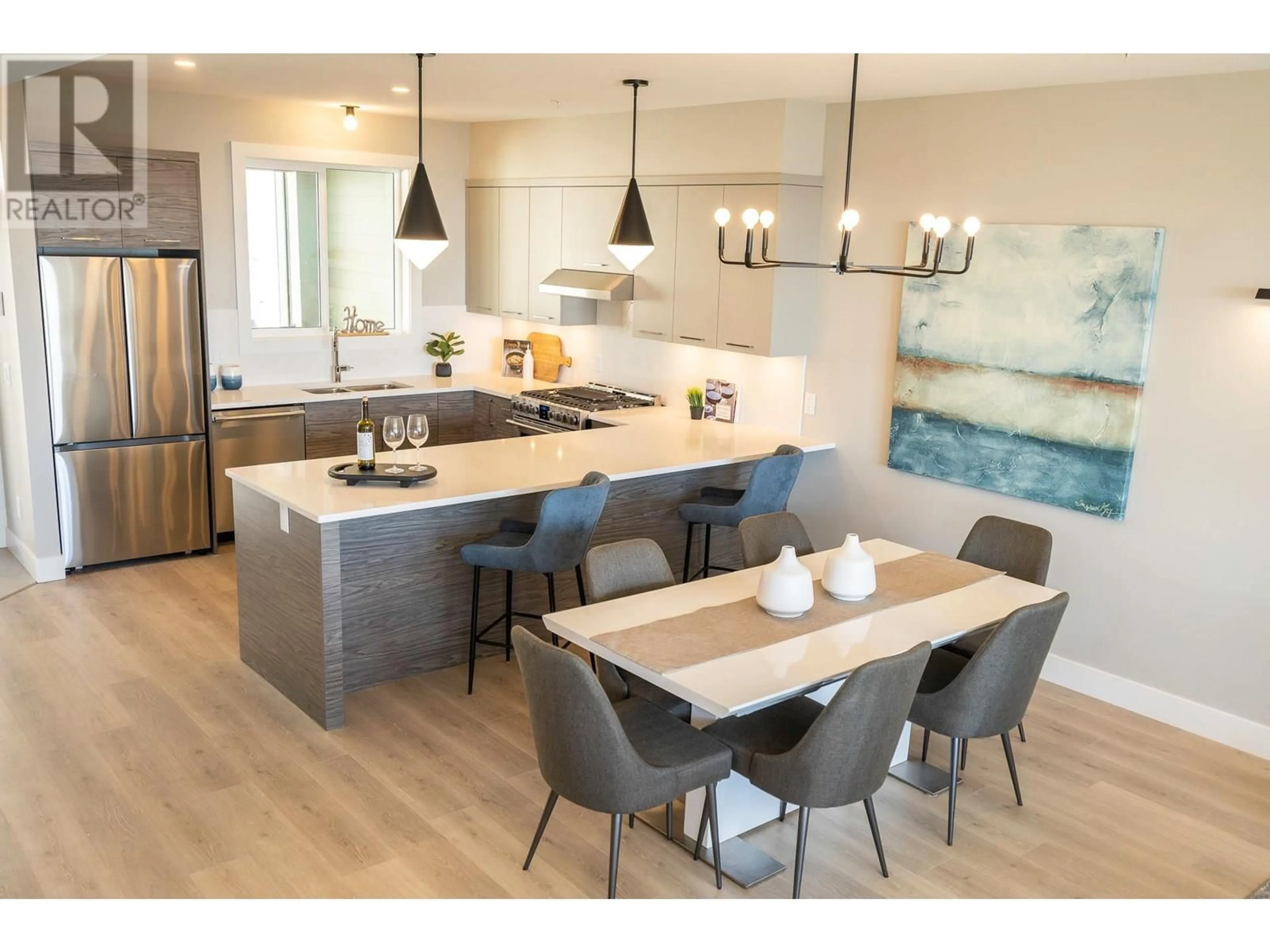 Open concept kitchen, wood/laminate floor for 270B GRIZZLY RIDGE TRAIL, Big White British Columbia V1P1P4
