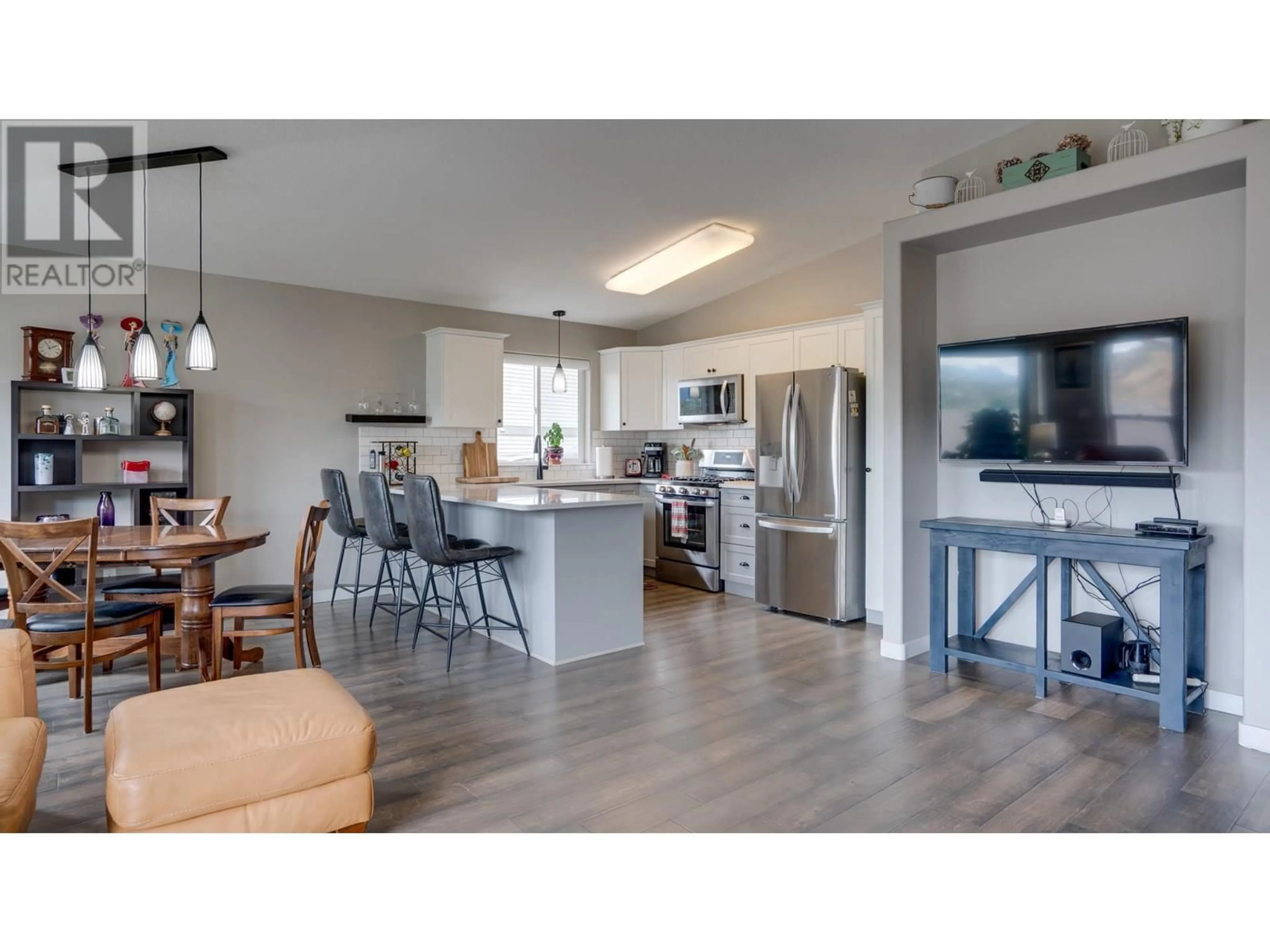 Open concept kitchen, wood/laminate floor for 4 - 4700 BELLA VISTA ROAD, Vernon British Columbia V1T2N4