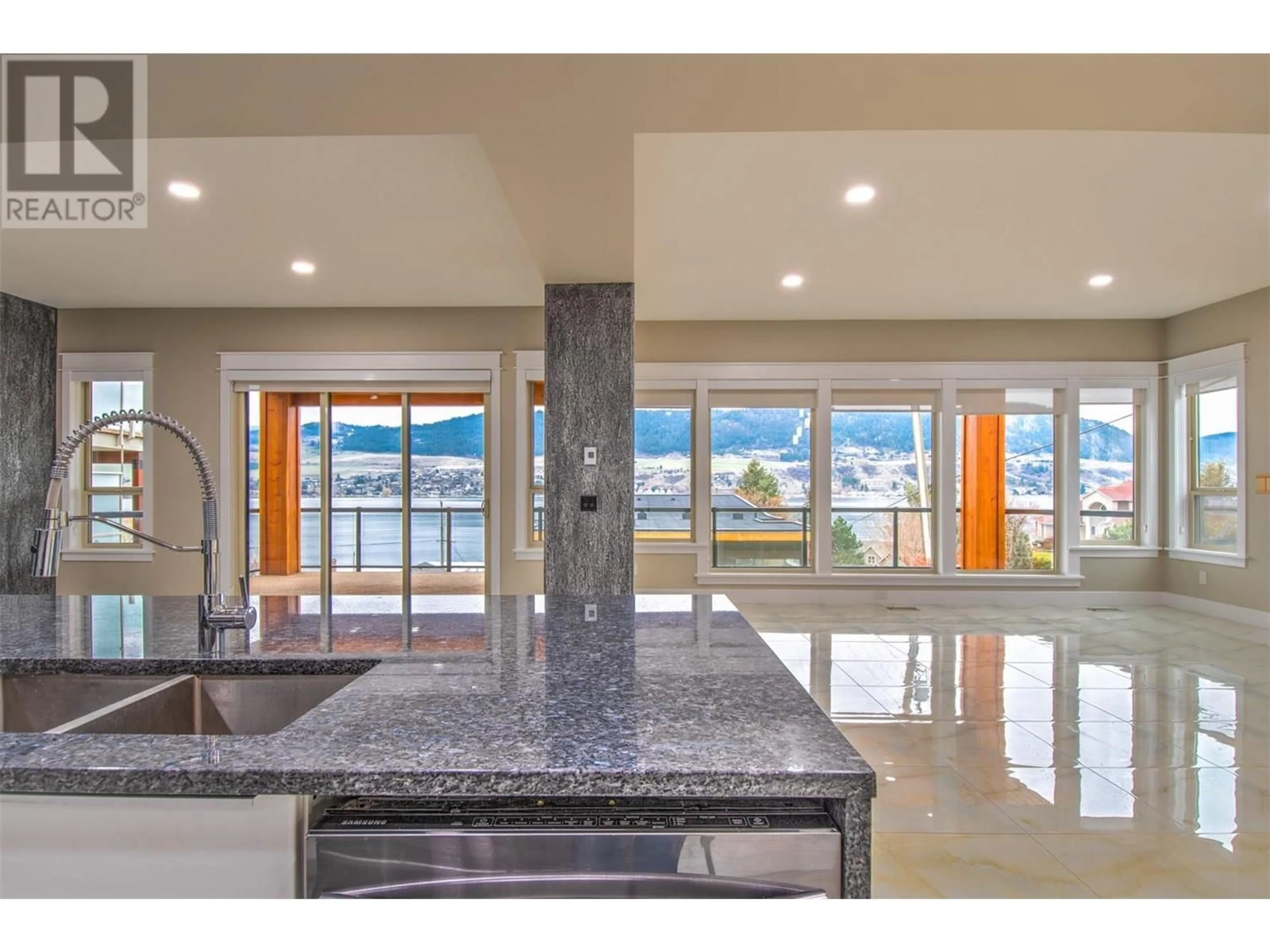 Open concept kitchen, ceramic/tile floor for 7509 KENNEDY LANE, Vernon British Columbia V1H1C4