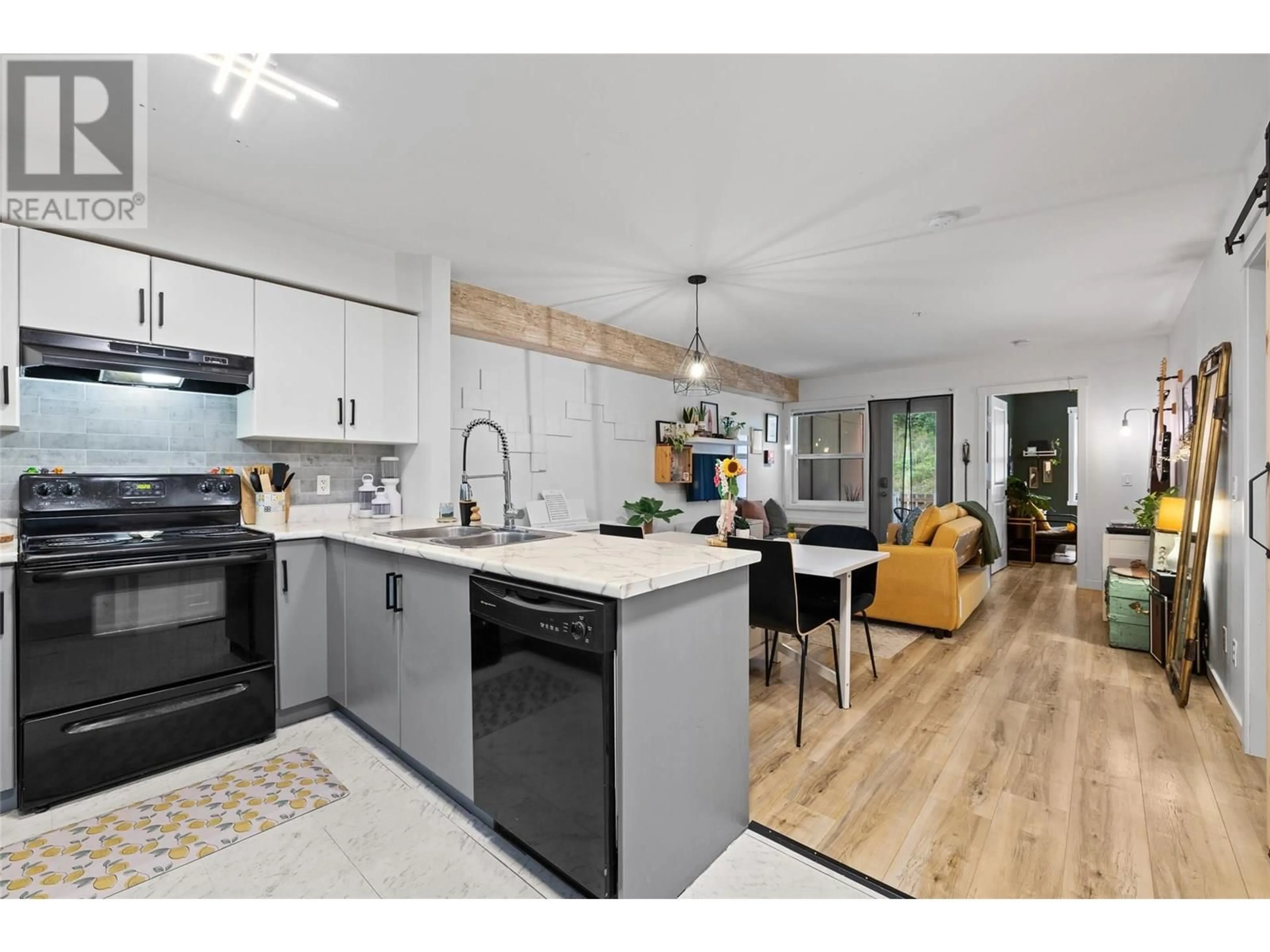 Open concept kitchen, unknown for 210 - 1481 GLENMORE ROAD NORTH, Kelowna British Columbia V1V2C5
