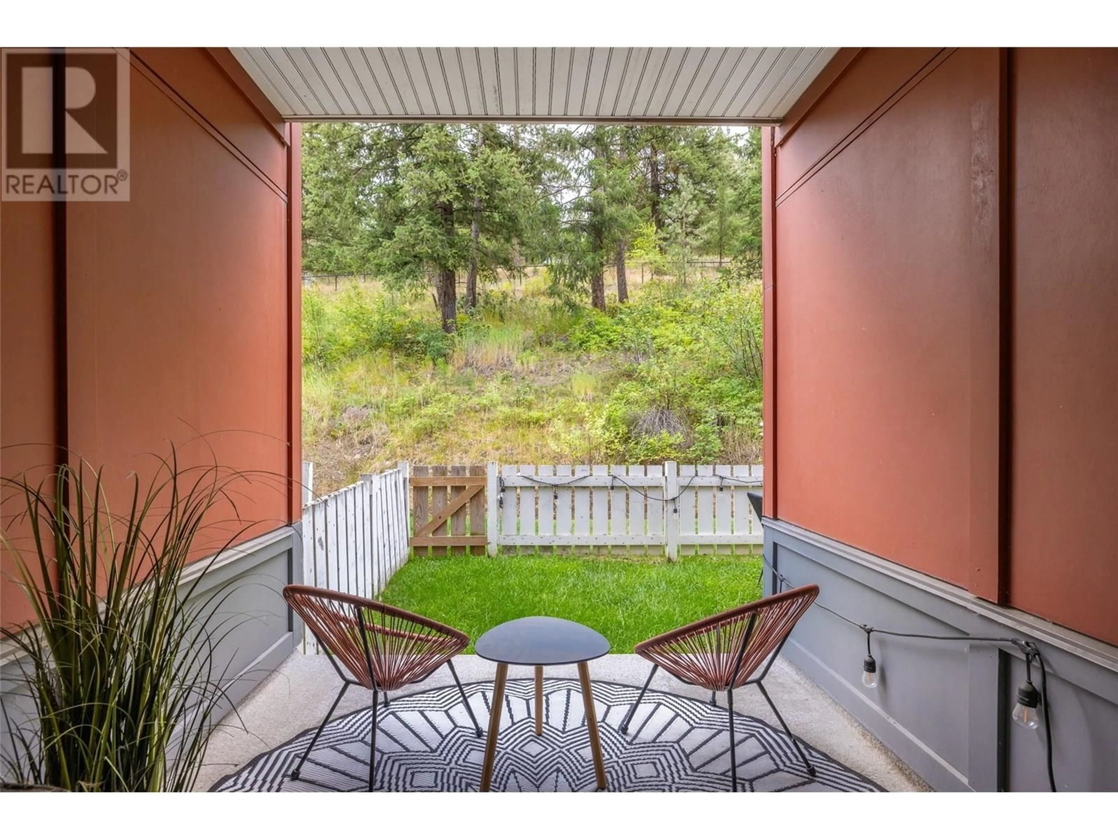 Patio, forest/trees view for 210 - 1481 GLENMORE ROAD NORTH, Kelowna British Columbia V1V2C5